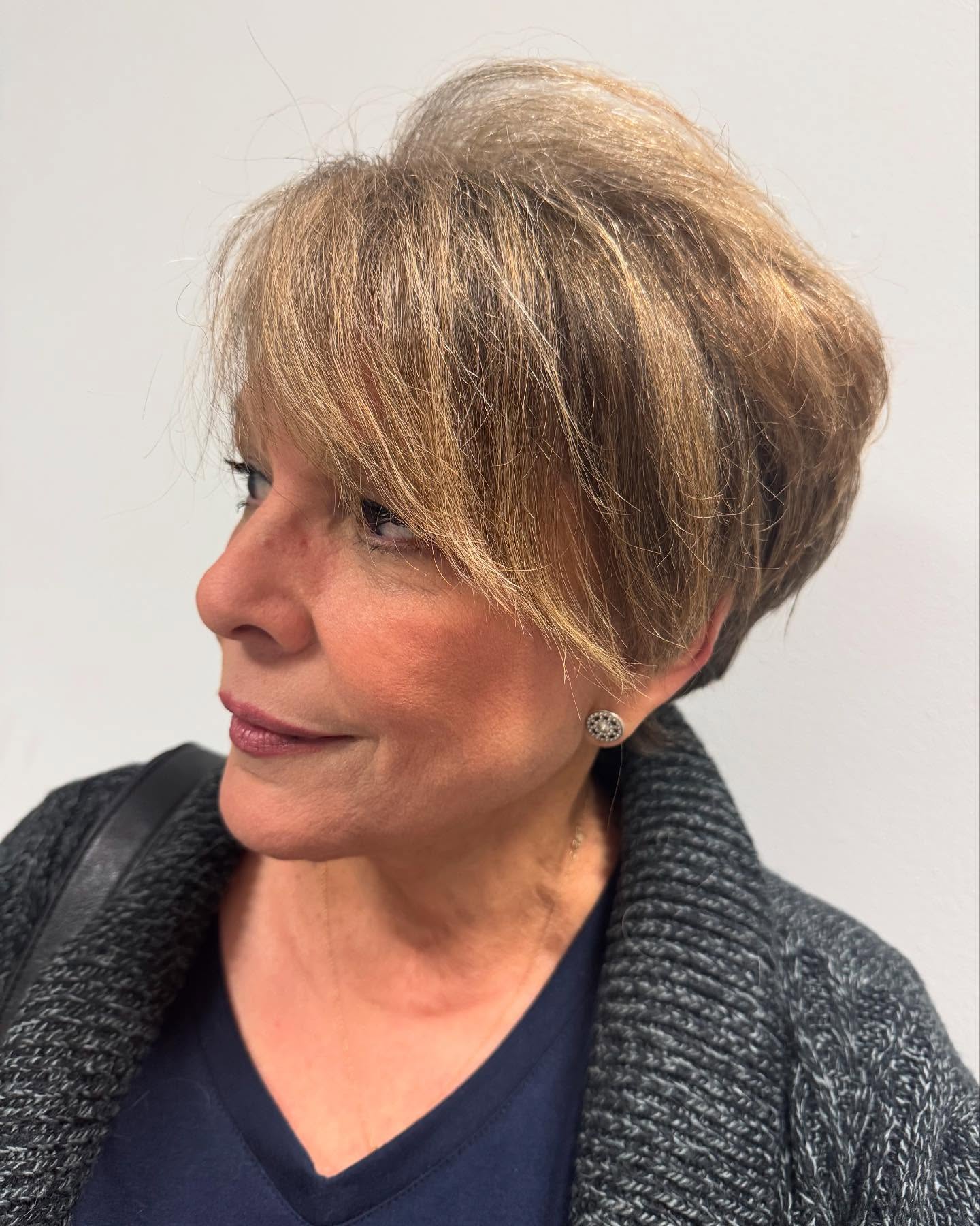 Elegant Short Layered Cut with Soft Face Framing