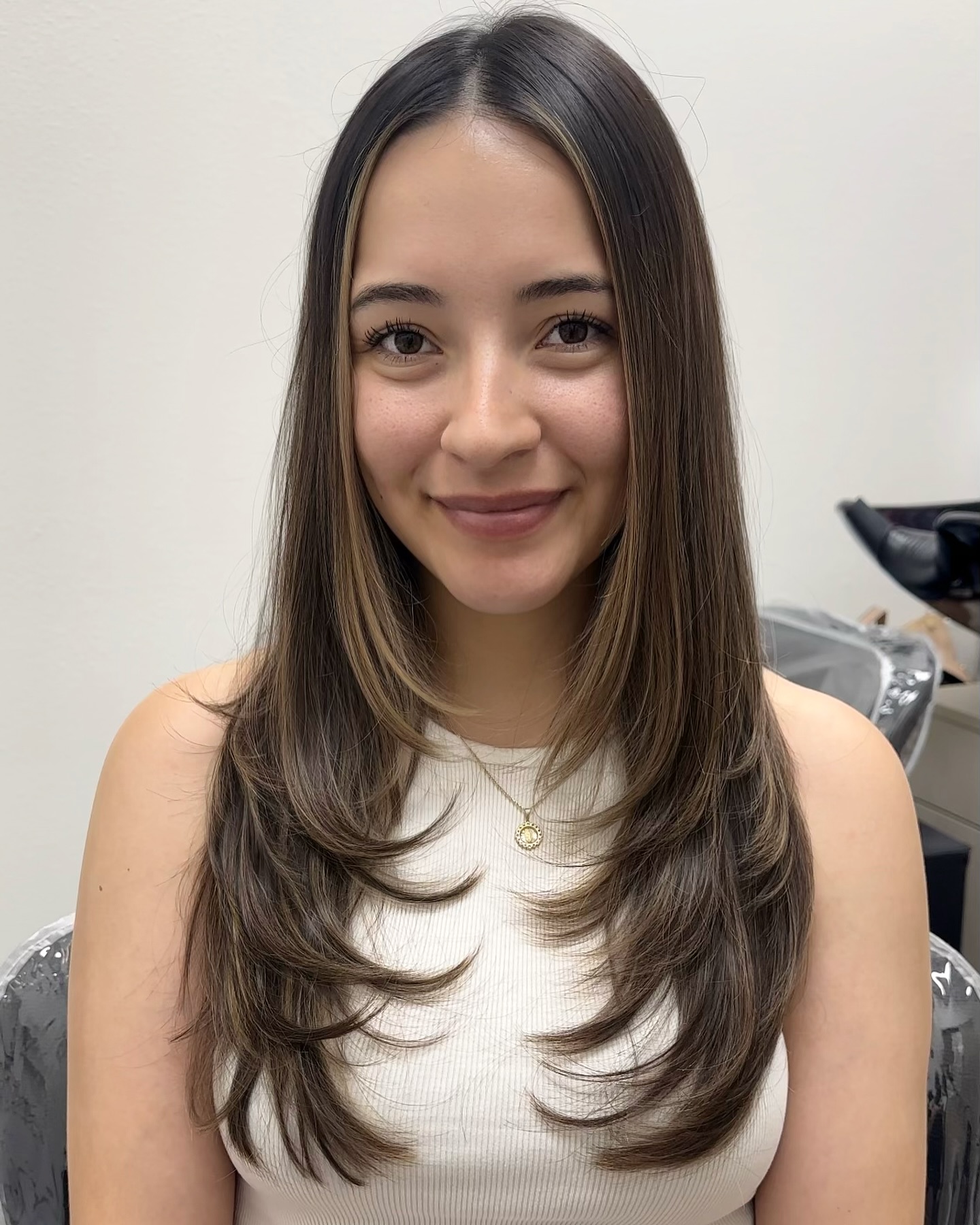 long layered cut with subtle highlights