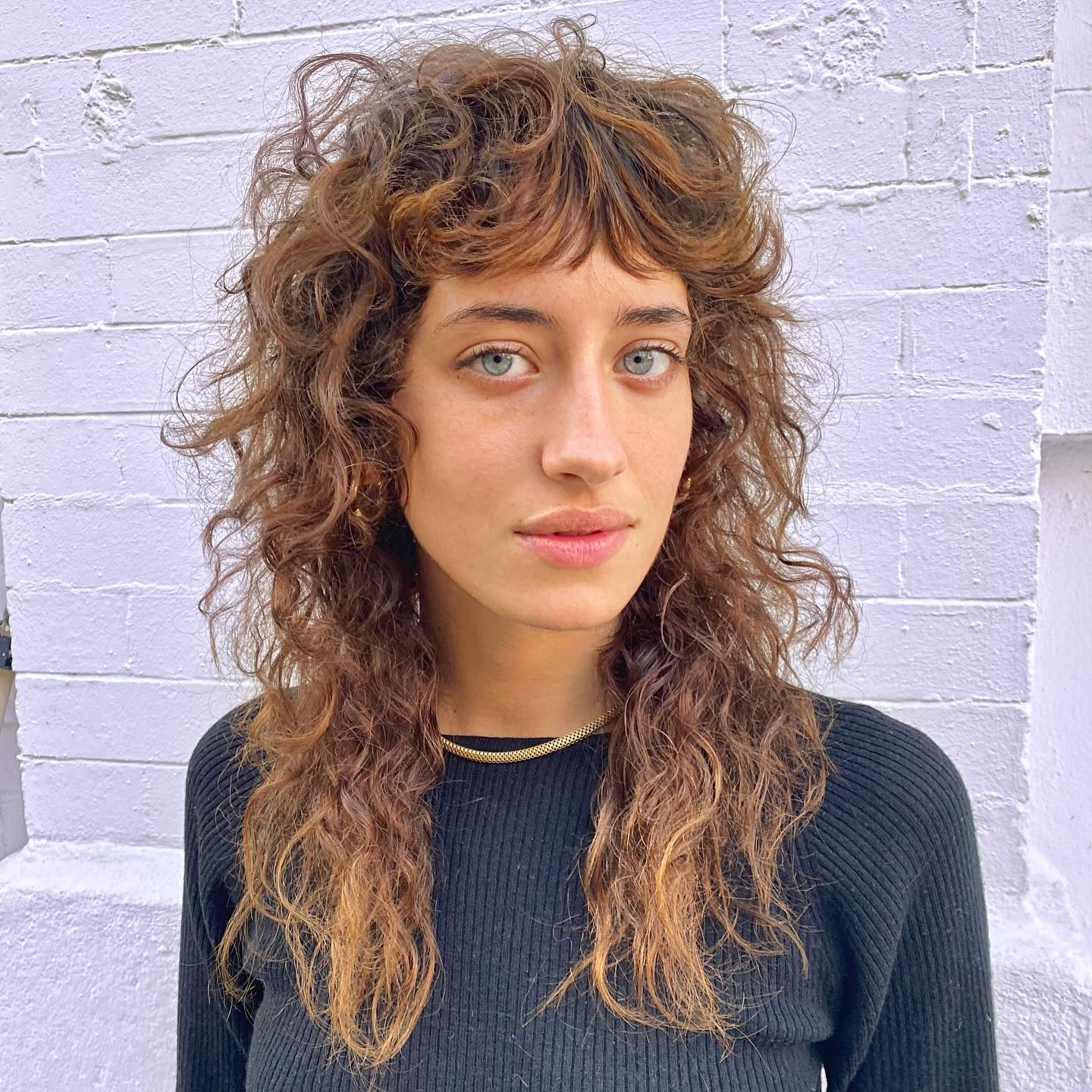 Modern Curly Shag with Defined Micro Bangs