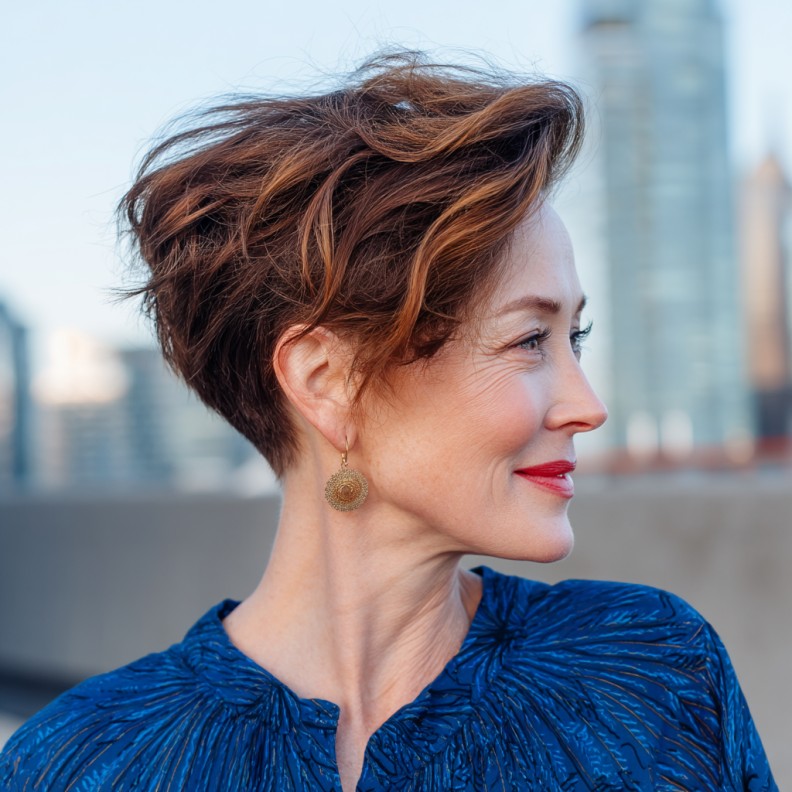 Modern Textured Side-Swept Pixie with Warm Highlights