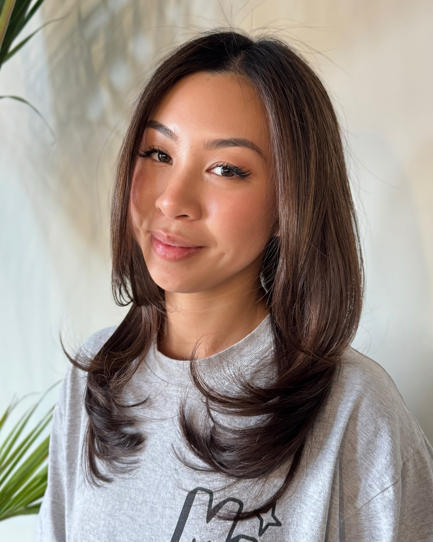Stylish Long Layered Cut with Soft Face Framing