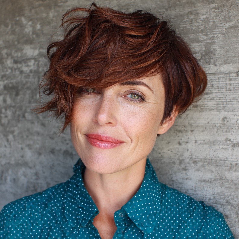 Textured Asymmetrical Pixie Cut with Rich Auburn Tones