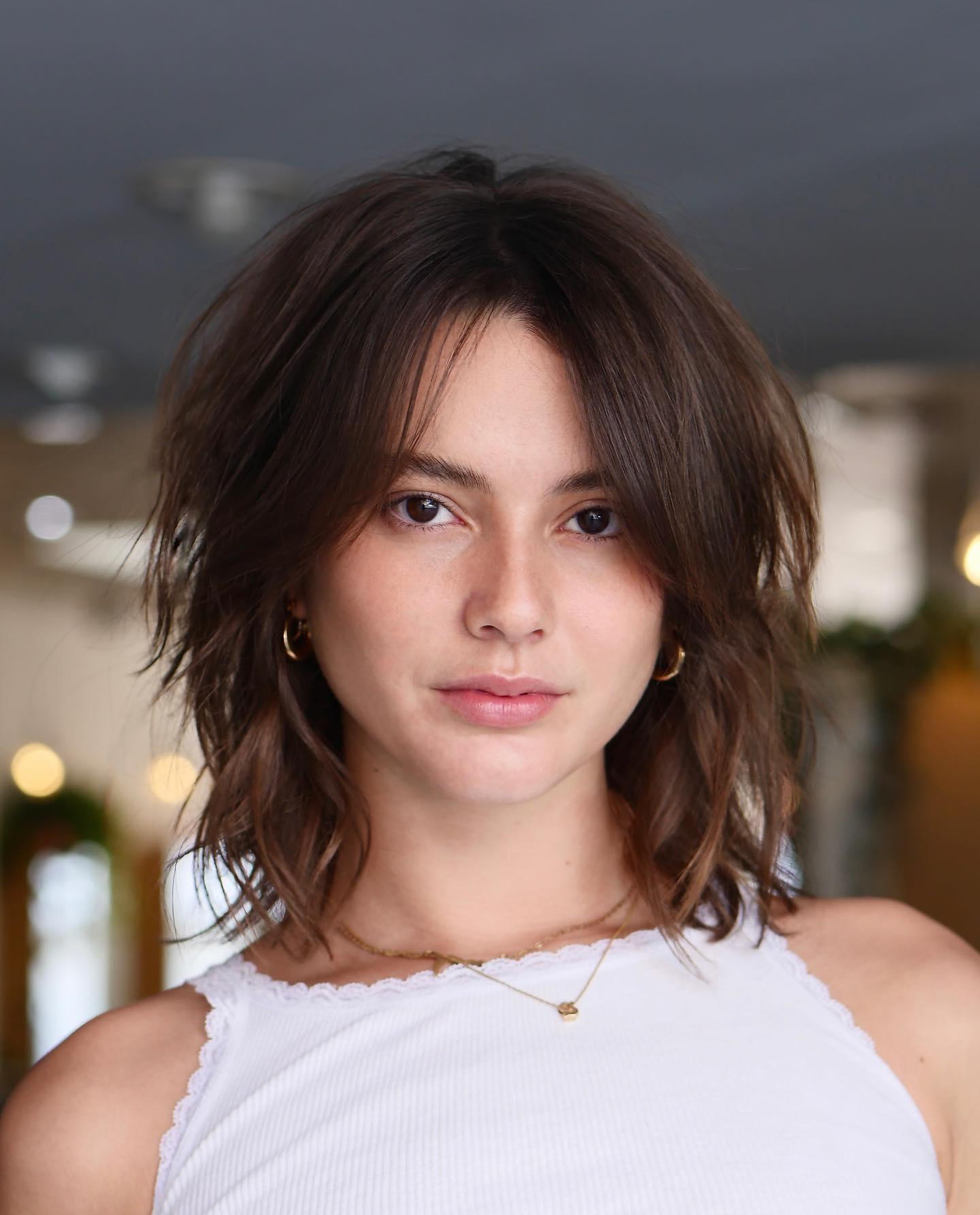 Textured Medium-Length Choppy Layers with Subtle Highlights