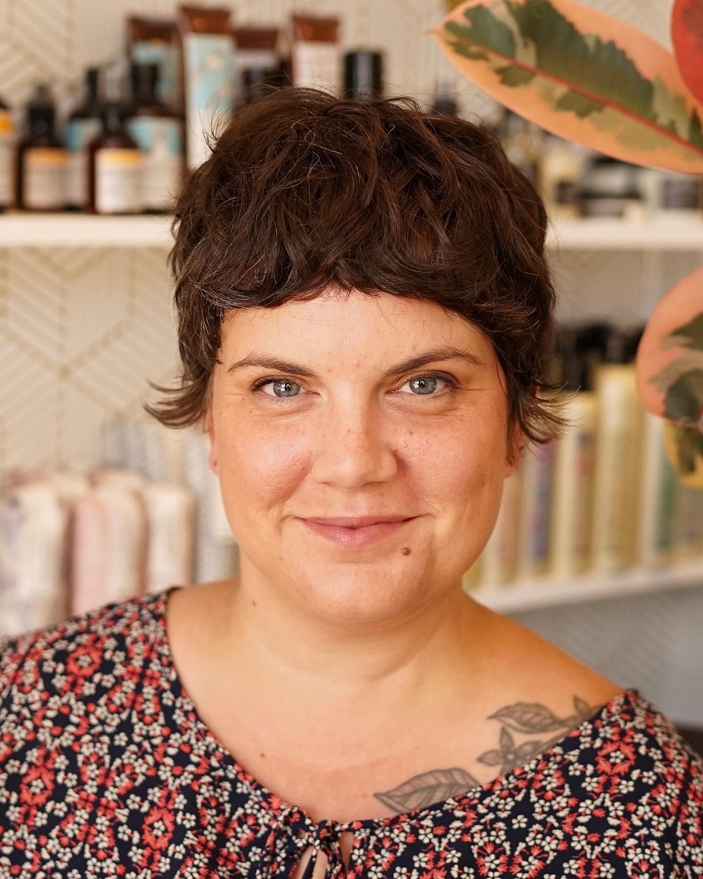 Textured Short Layered Cut with Curly Bangs