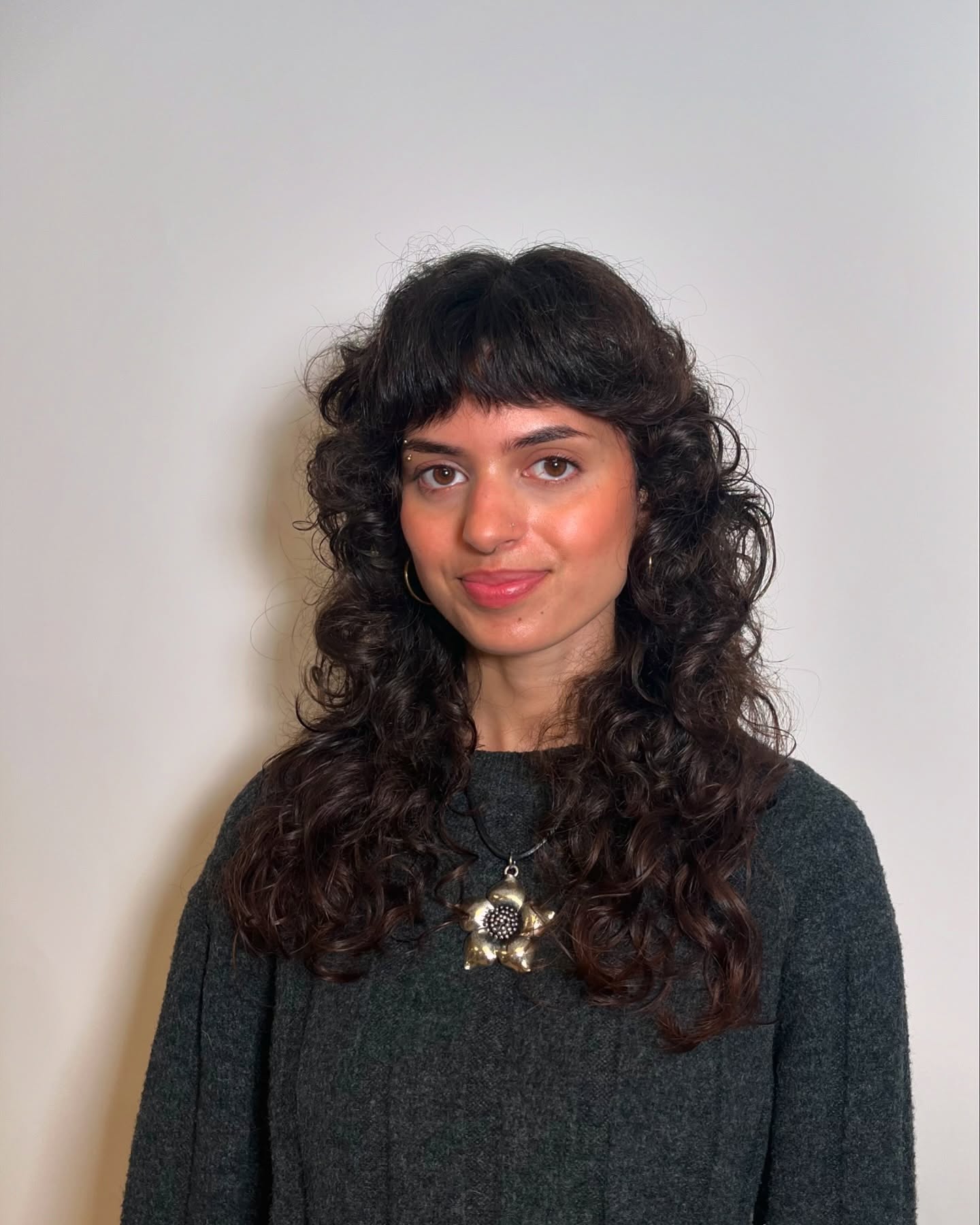 Trendy Curly Shag with Soft Fringed Bangs