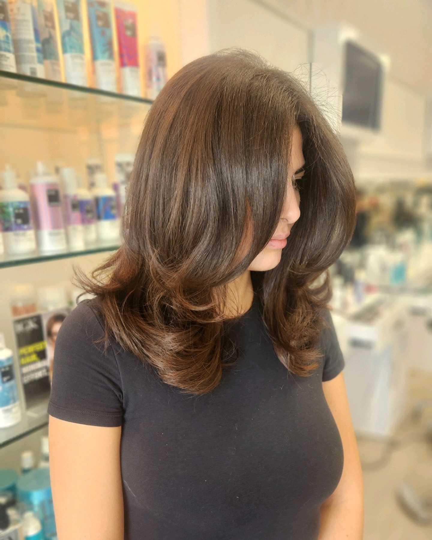 Voluminous Layered Cut with Rich Auburn Undertones