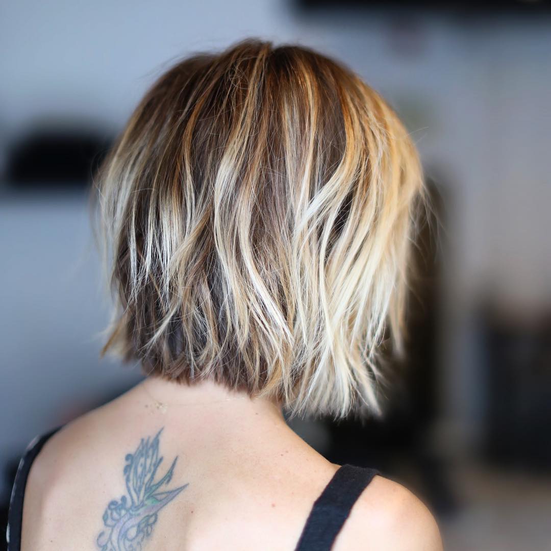 Chic Textured Bob with Sun-Kissed Highlights