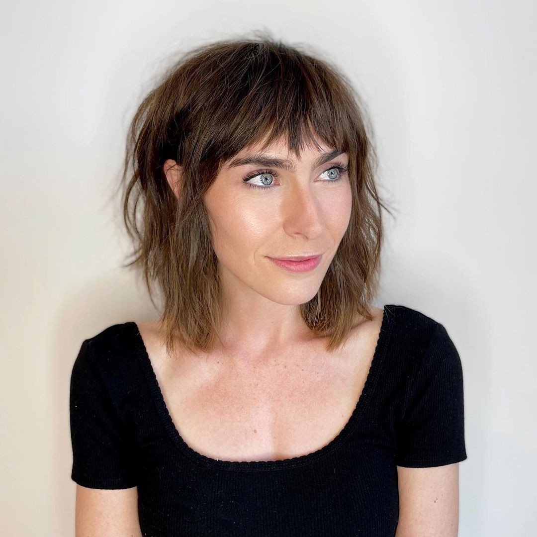 Choppy Bangs with Textured Medium-Length Layers