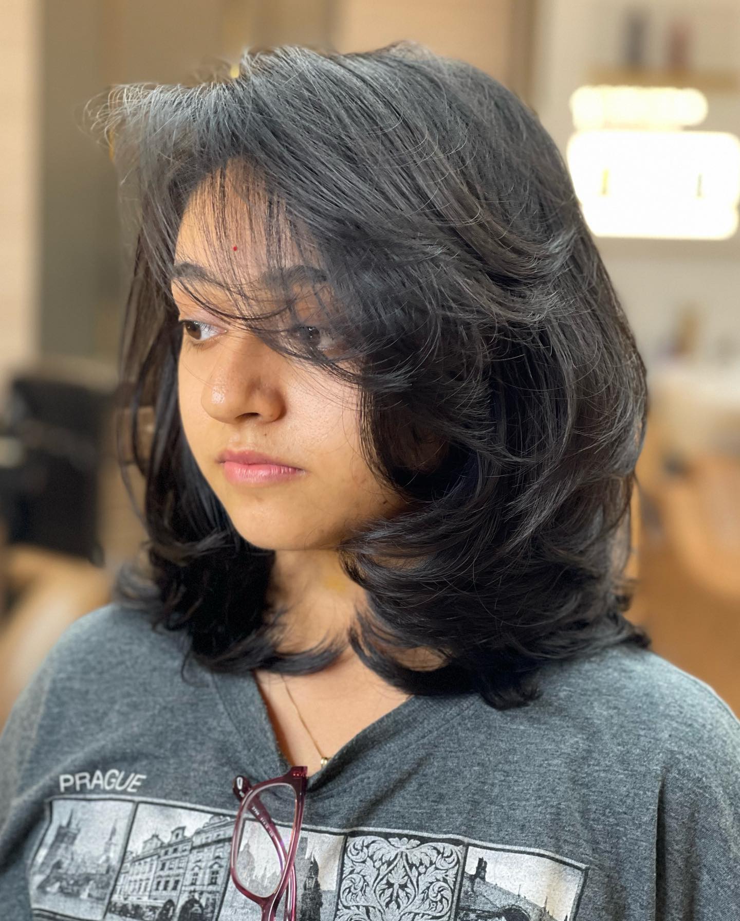 Softly Feathered Bangs with Layered Volume