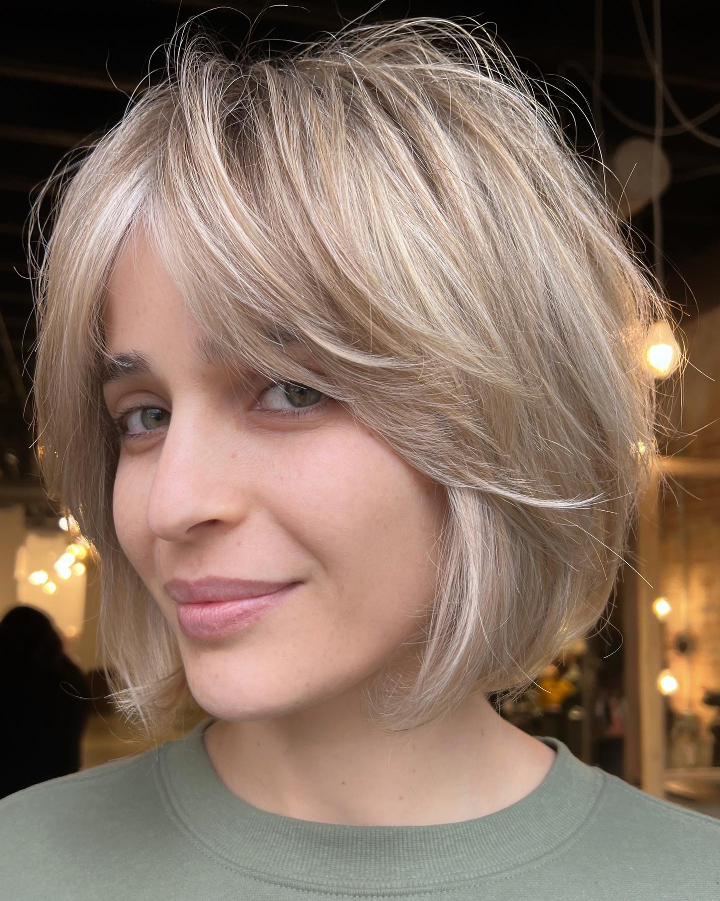 Softly Feathered Bob with Subtle Platinum Tones
