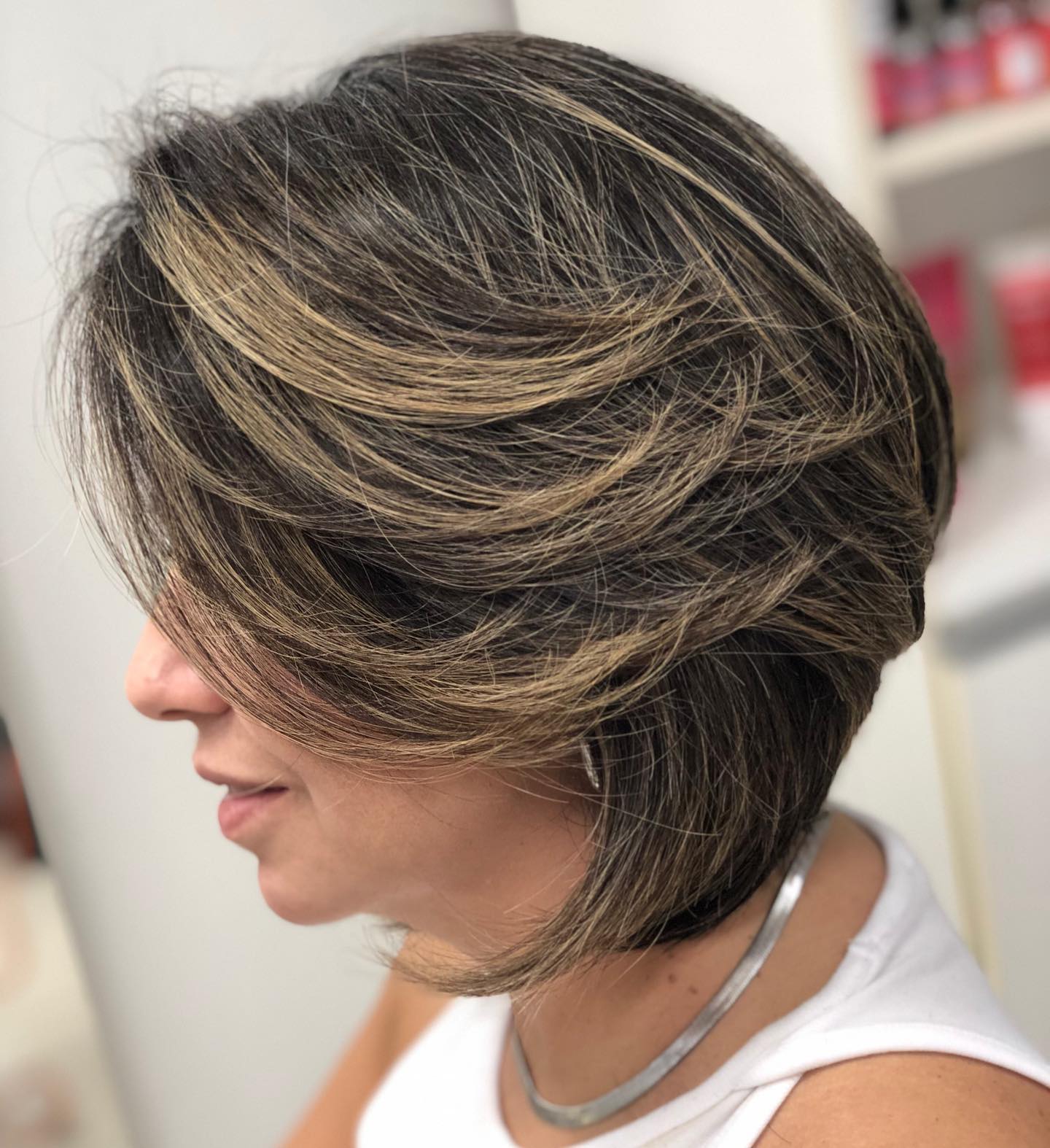 Stylish Feathered Bob with Subtle Caramel Highlights