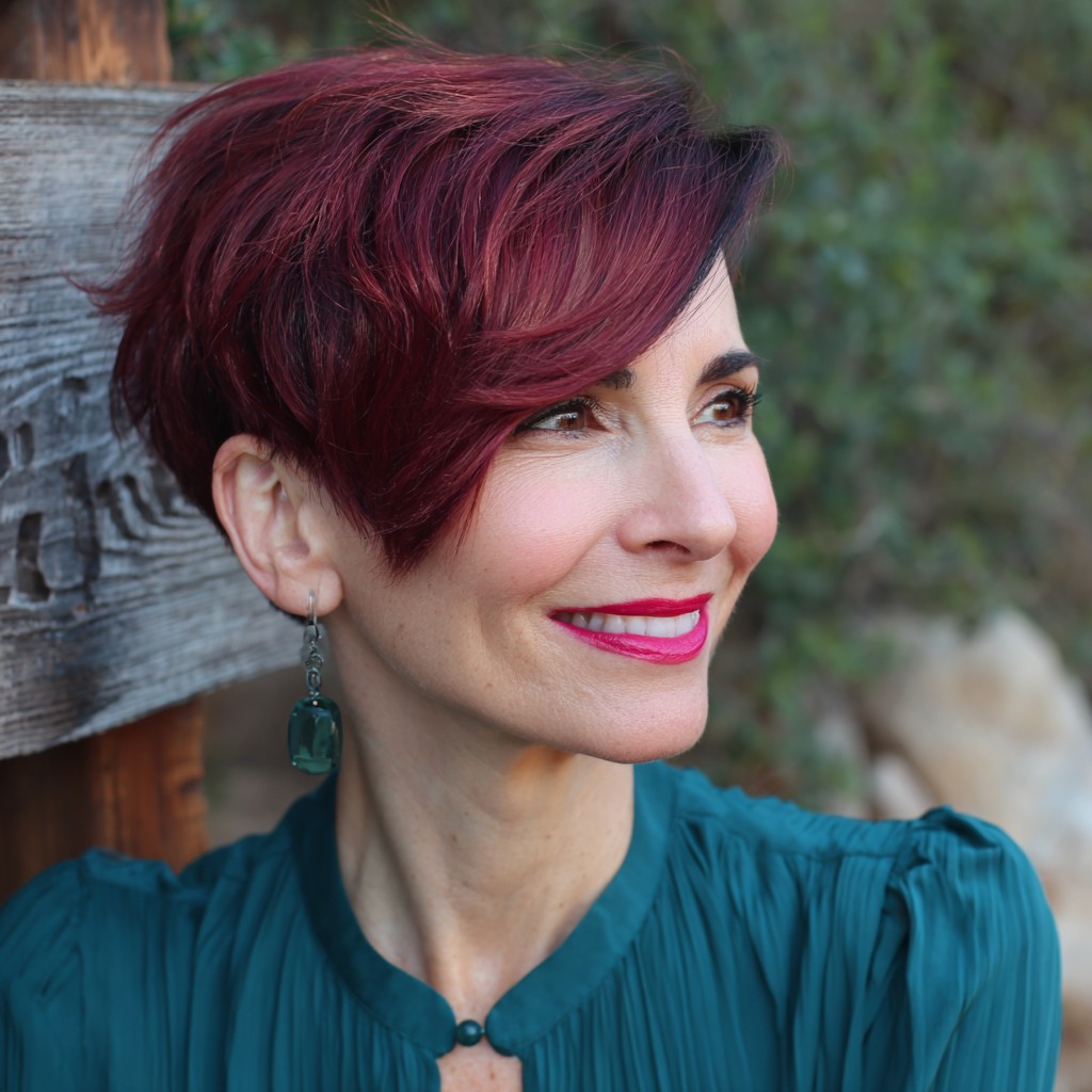 Stylish Ruby Red Short Layered Cut with Side-Swept Bangs