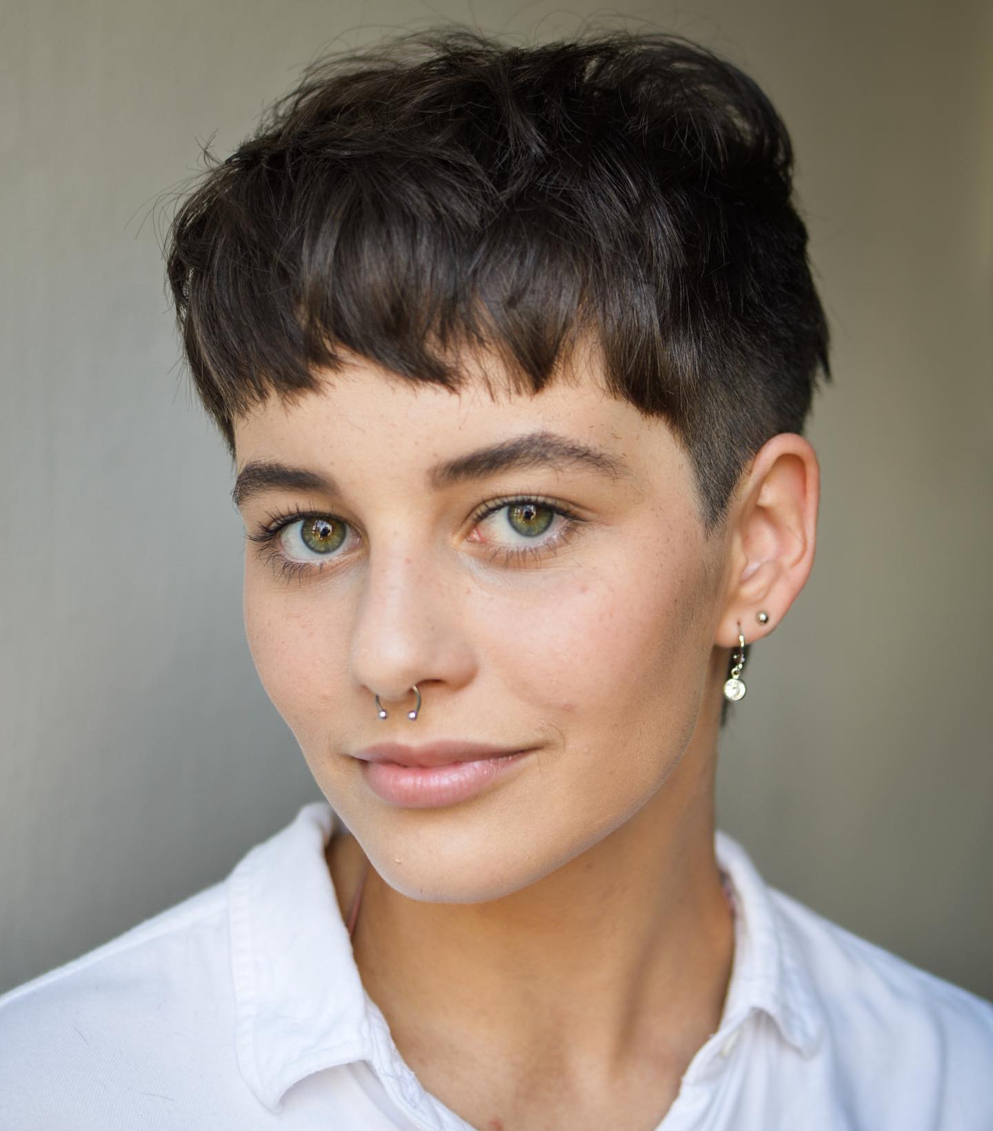 Edgy Textured Pixie Cut with Soft Fringes