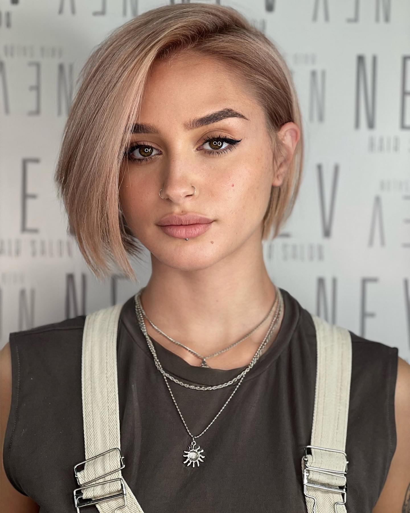 Stylish Asymmetrical Rounded Bob with Subtle Highlights