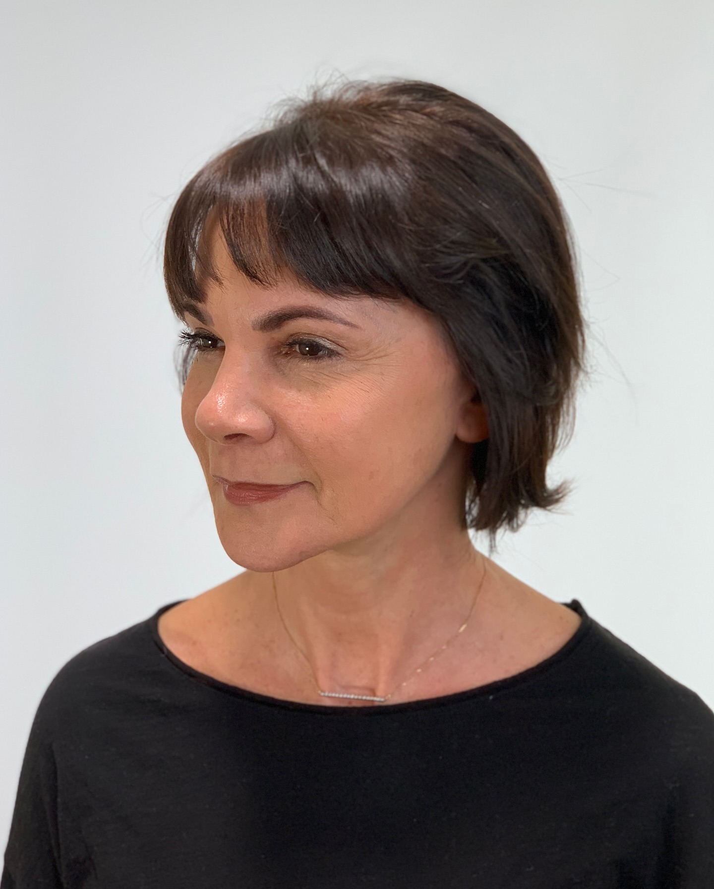 Chic Wispy Bangs with Soft Layered Bob