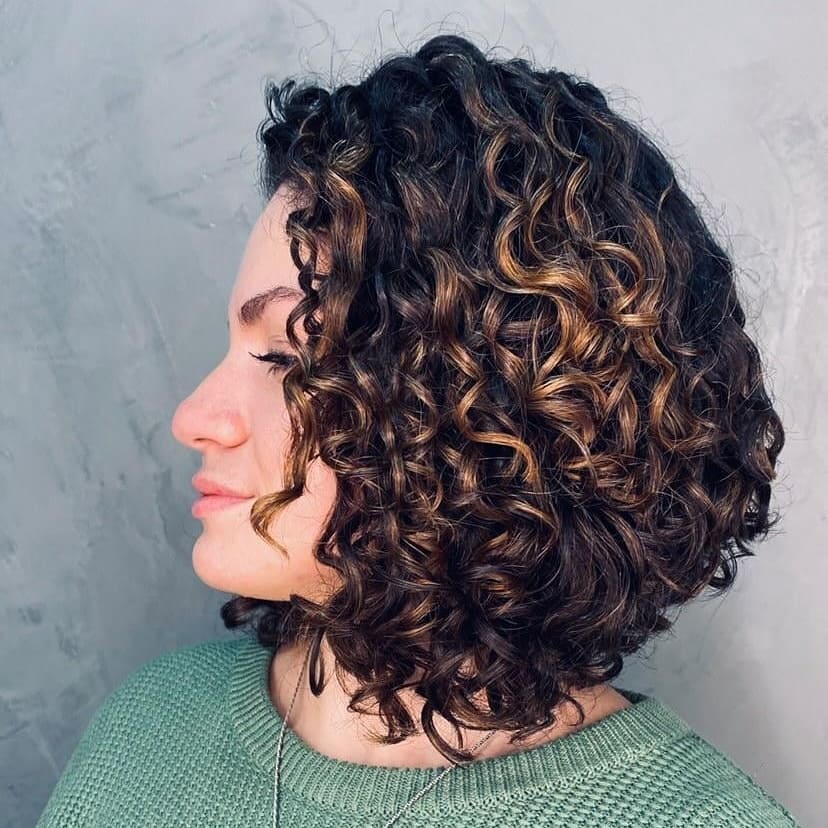 Curly Textured Long Bob with Sun-Kissed Highlights