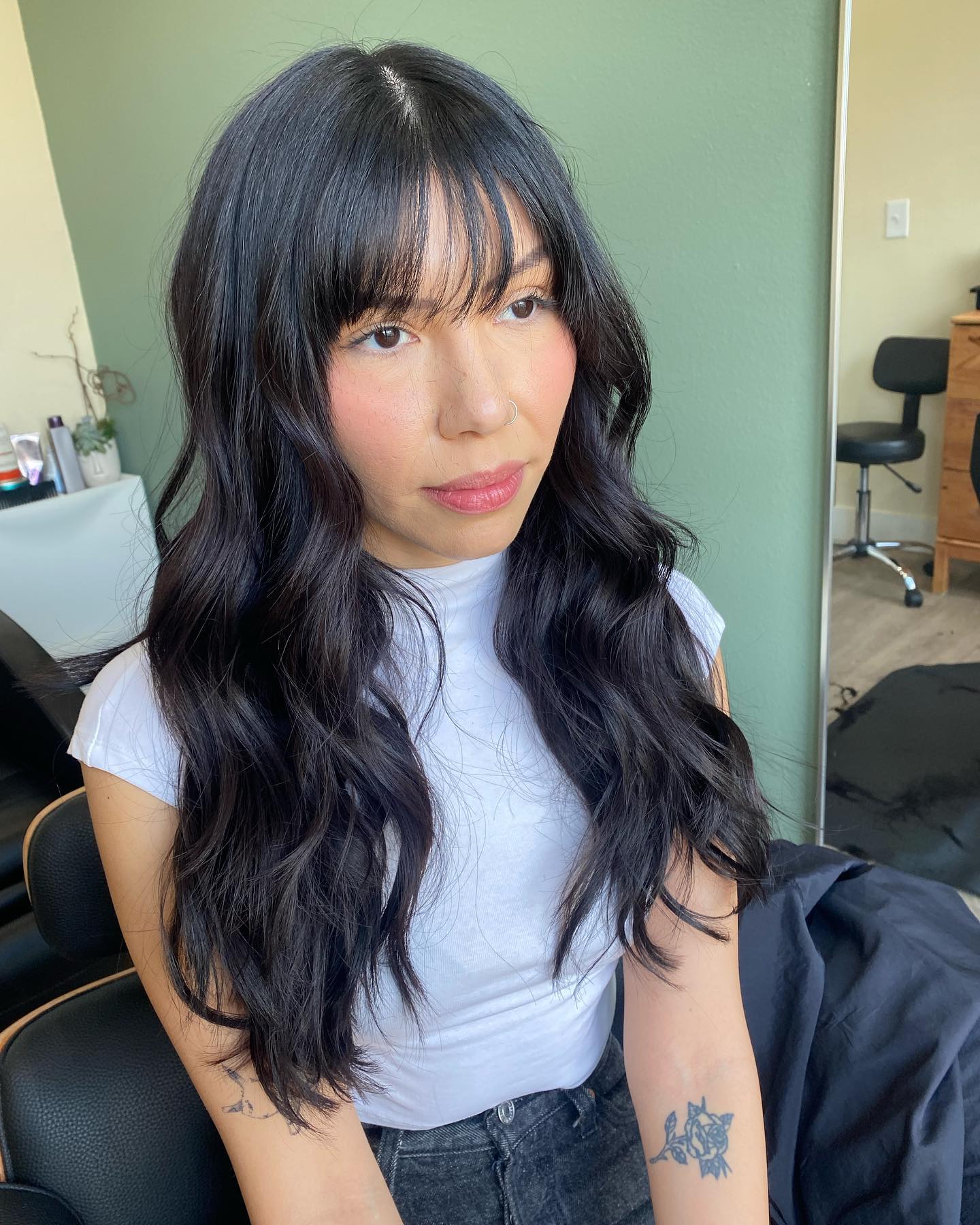 Elegant Long Waves with Wispy Bangs