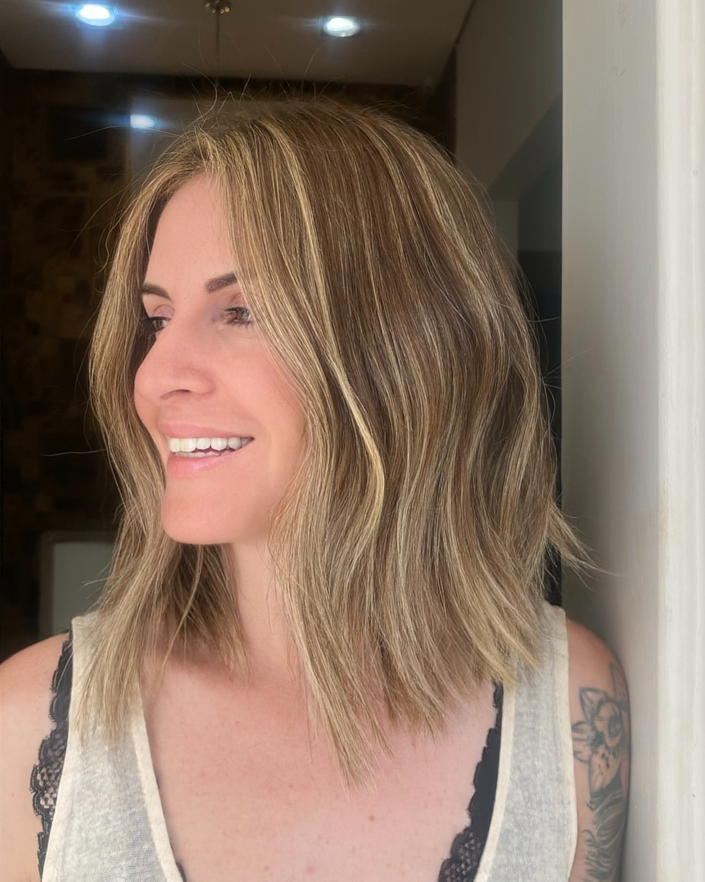 Soft Layered Long Bob with Golden Highlights