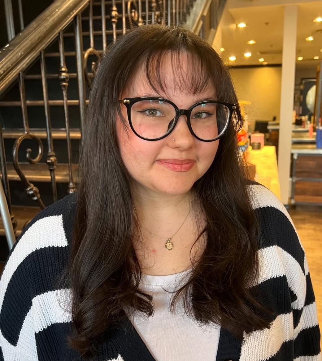 Softly Layered Dark Brunette Cut with Wispy Bangs