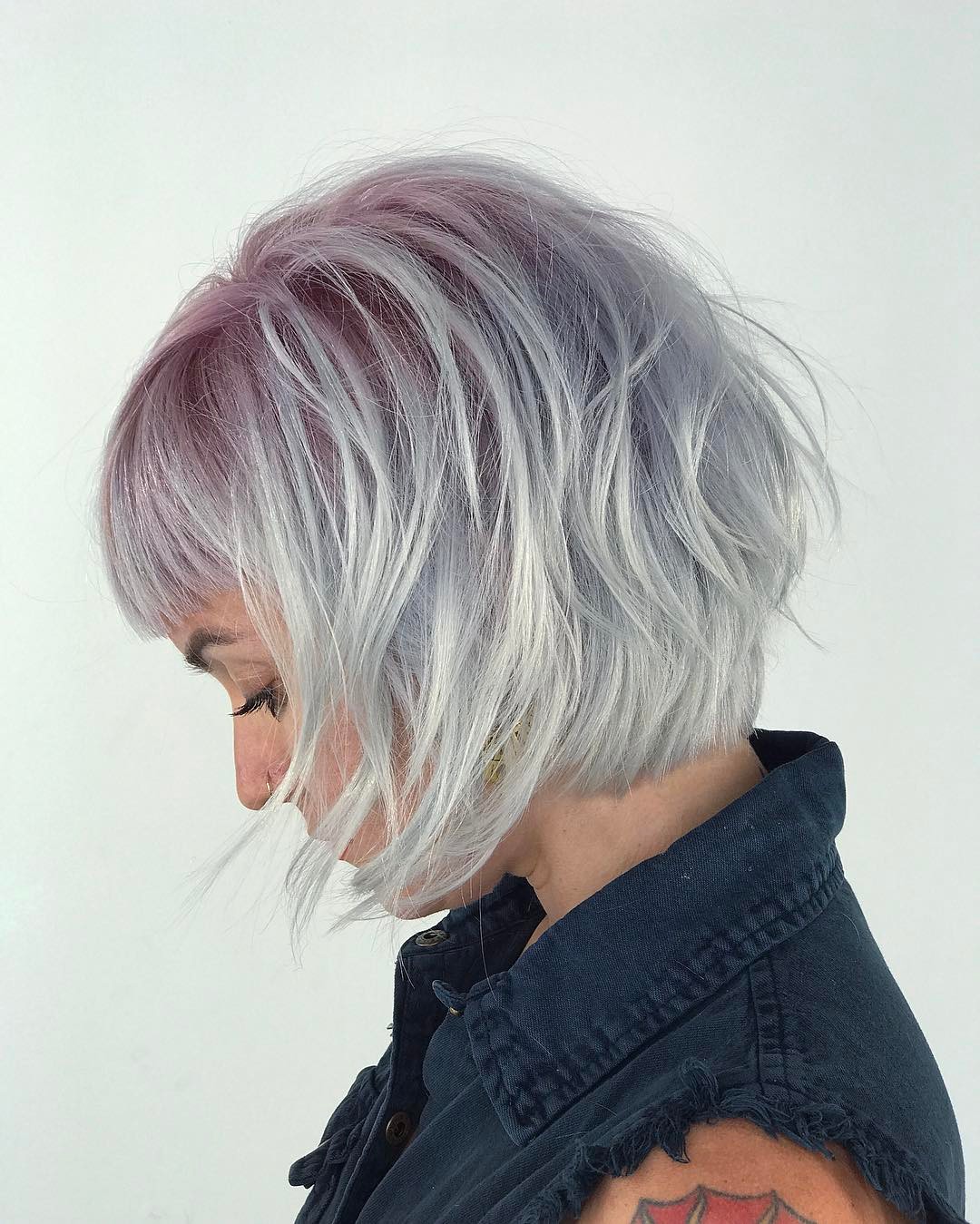 Chic Textured Bob with Subtle Lavender Highlights