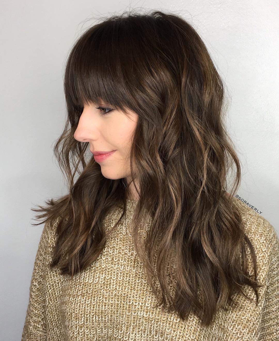 Chic Textured Layers with Soft Bangs