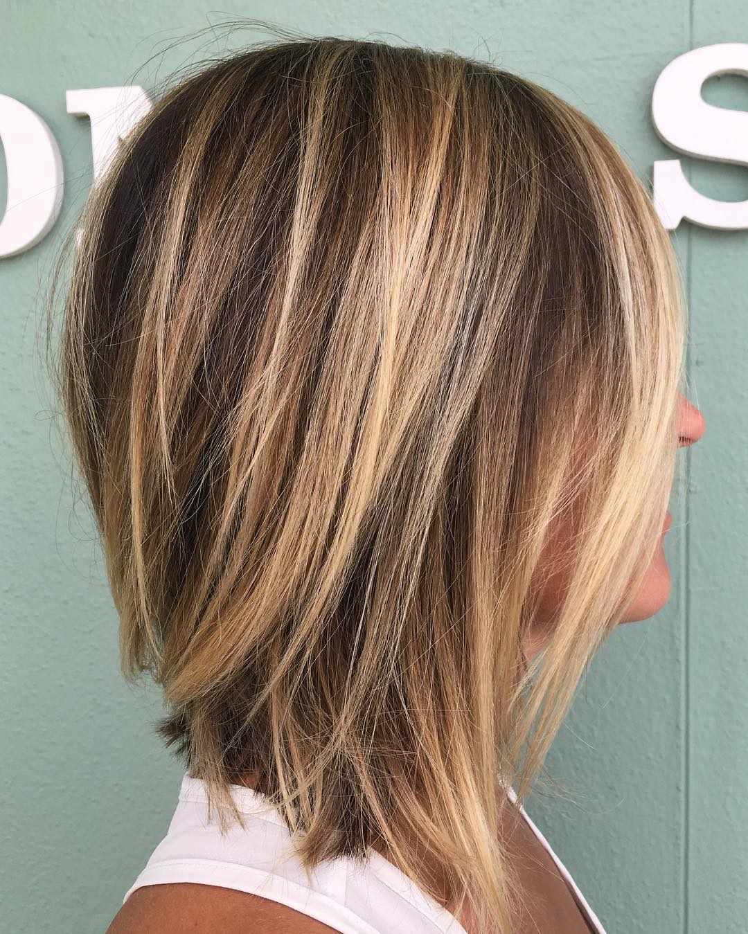 Chic Textured Long Bob with Subtle Highlights