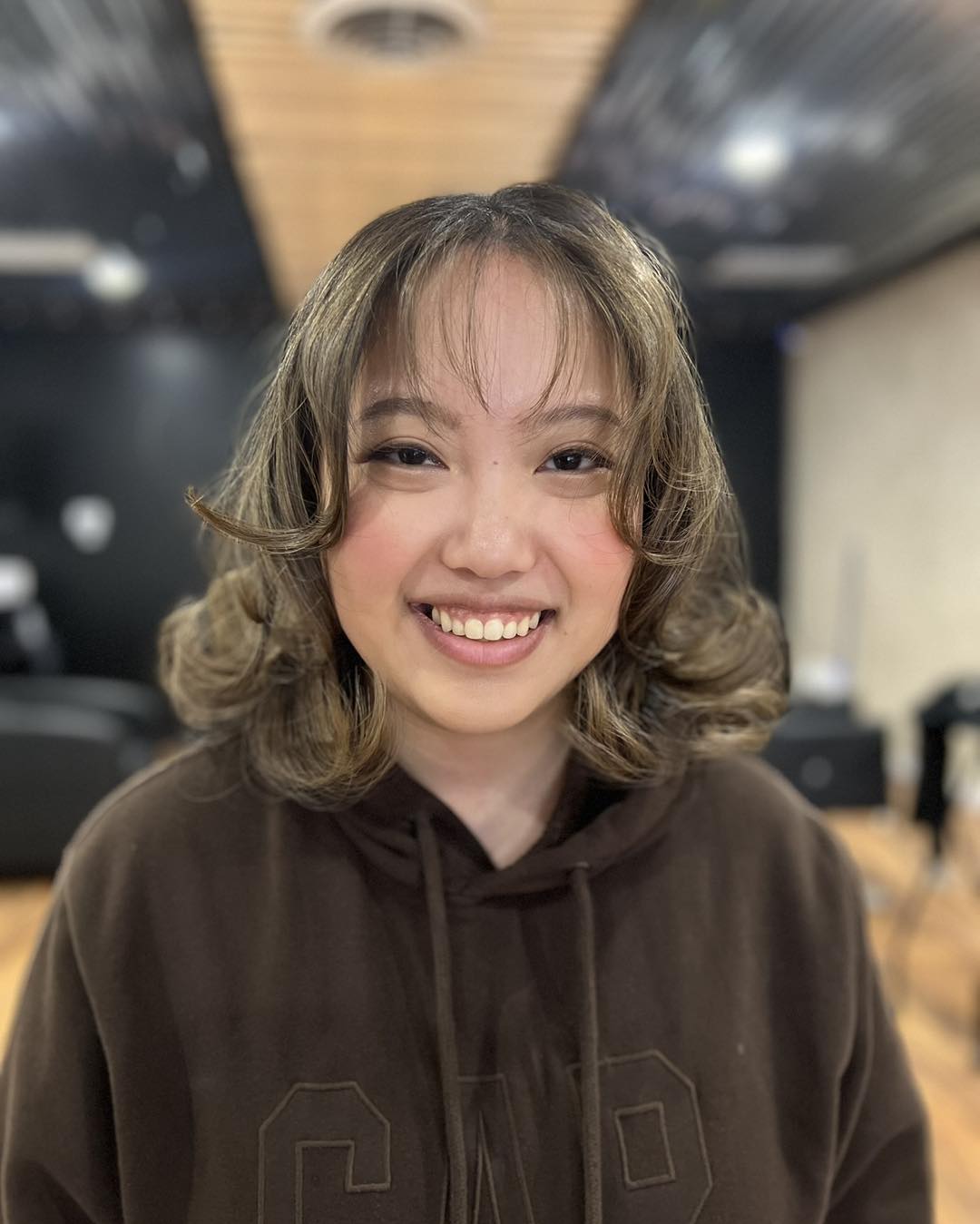 Playful Curly Lob with Wispy Bangs