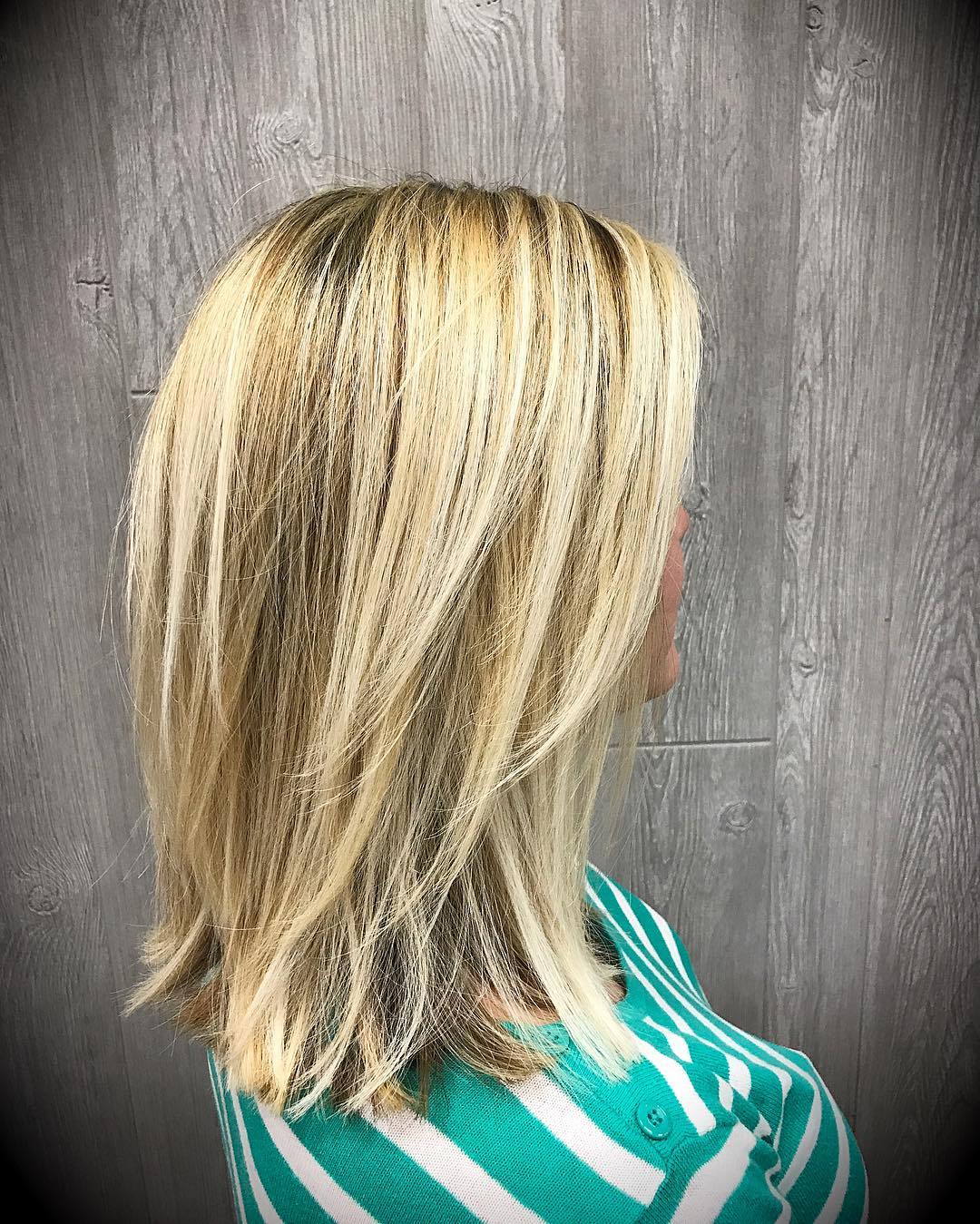 Textured Long Layered Cut with Sun-Kissed Highlights