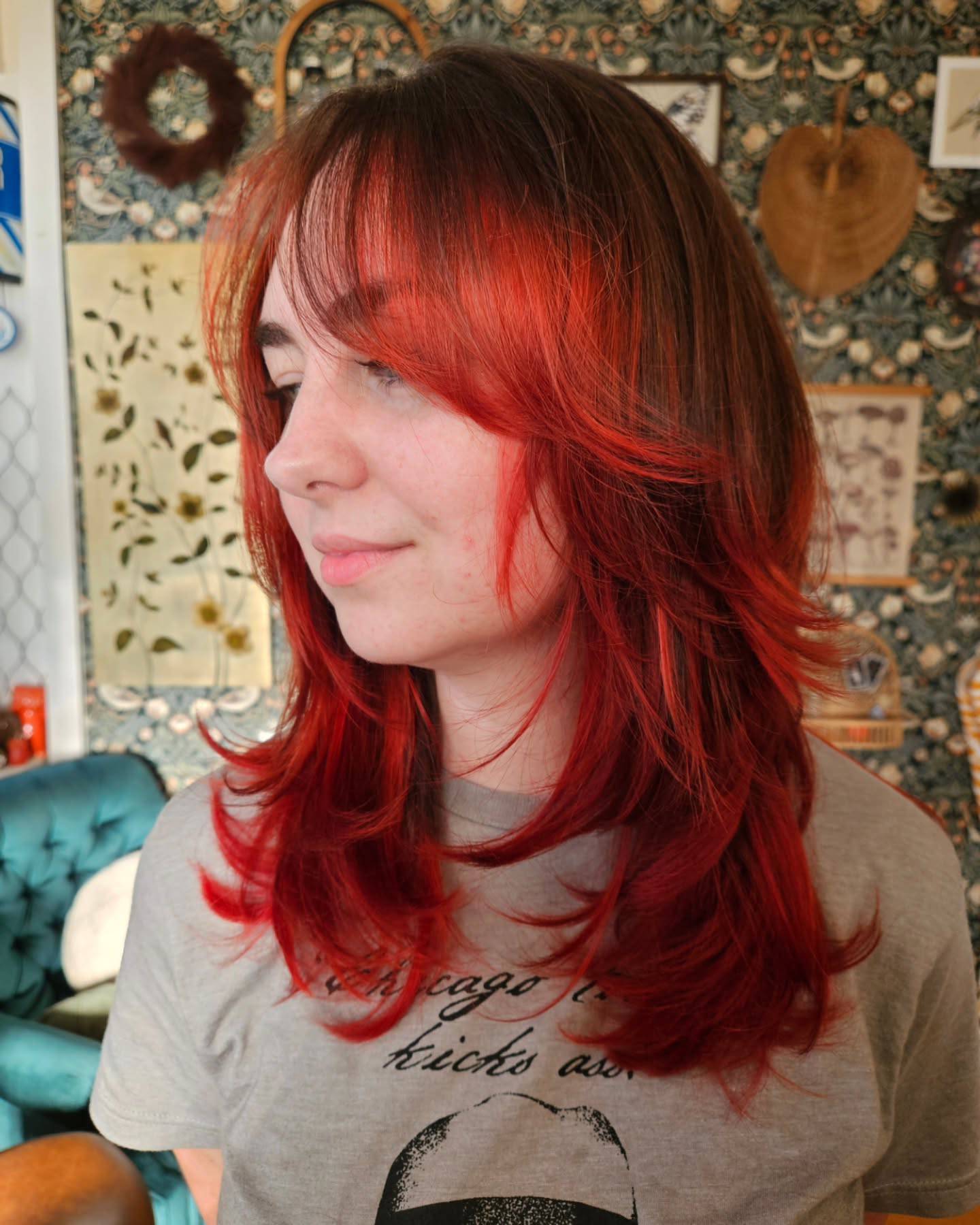 Vibrant Red Layered Cut with Soft Bangs