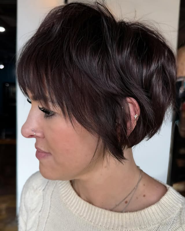 Chic Layered Brunette Pixie with Textured Ends