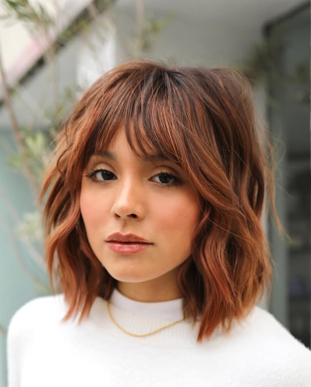 Chic Textured Bob with Subtle Copper Highlights