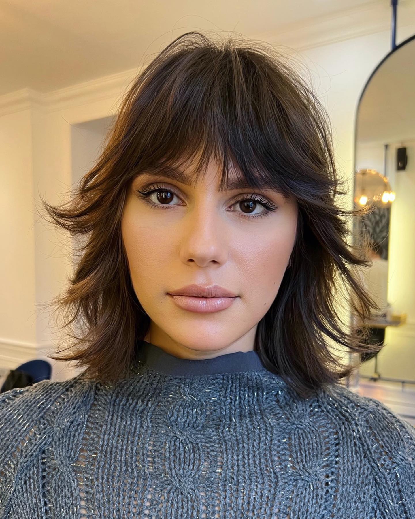 Chic Textured Wolf Cut with Face-Framing Layers