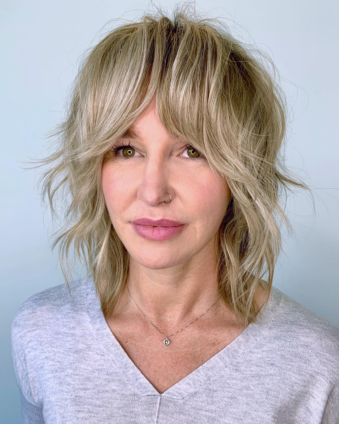 Chic Textured Wolf Cut with Soft Face-Framing Layers