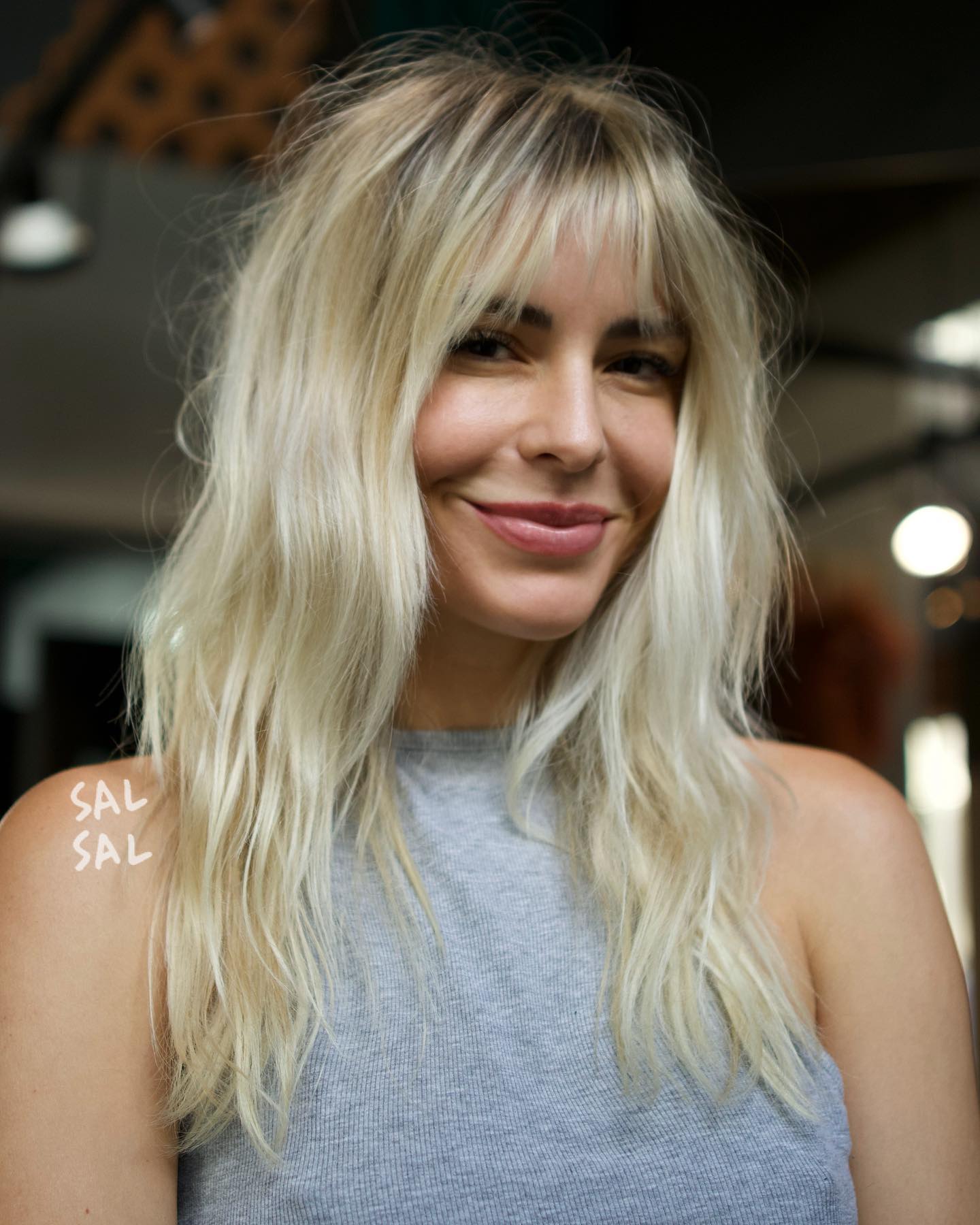 Effortlessly Chic Soft Bangs with Long Beachy Waves