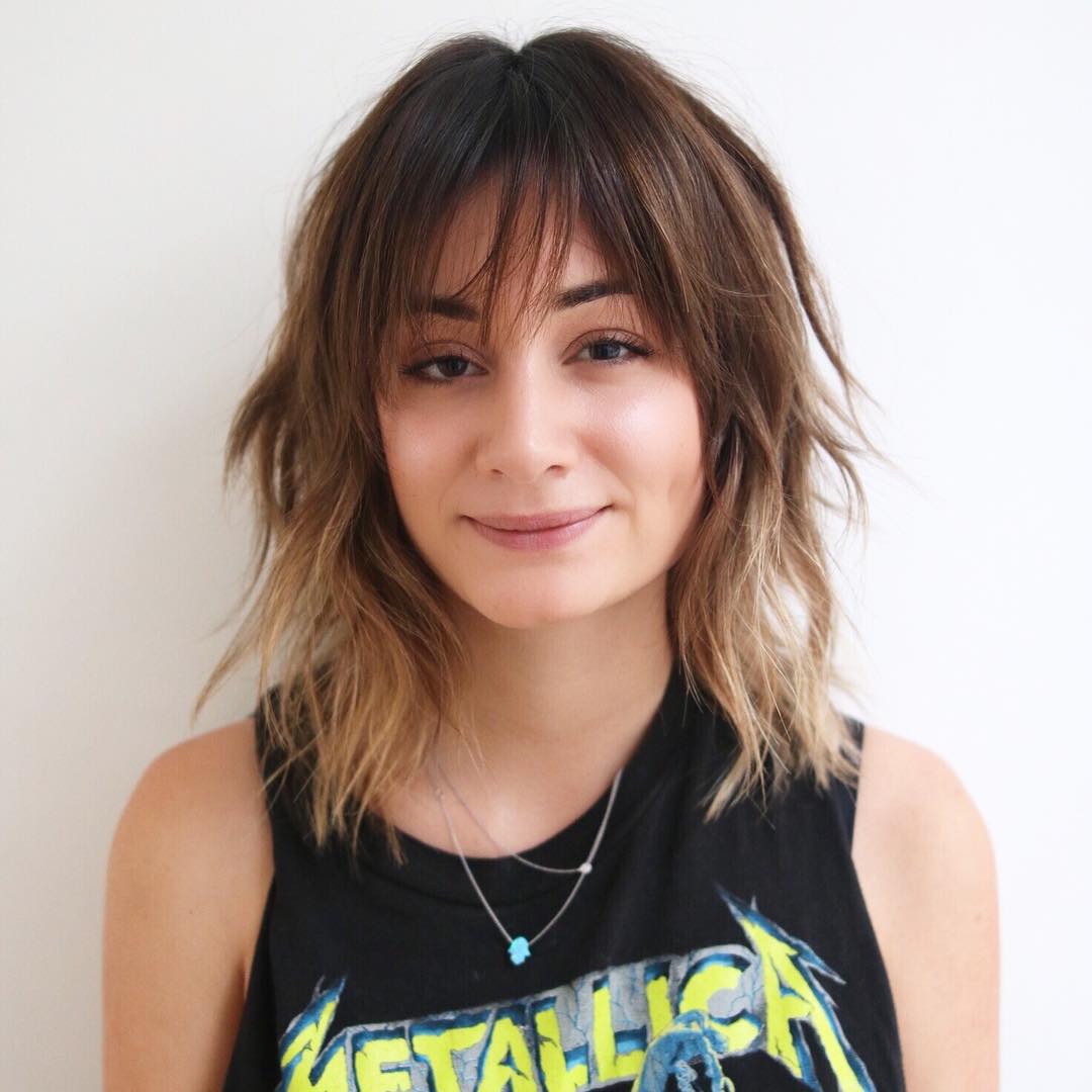 Effortlessly Tousled Soft Bangs with Textured Layers