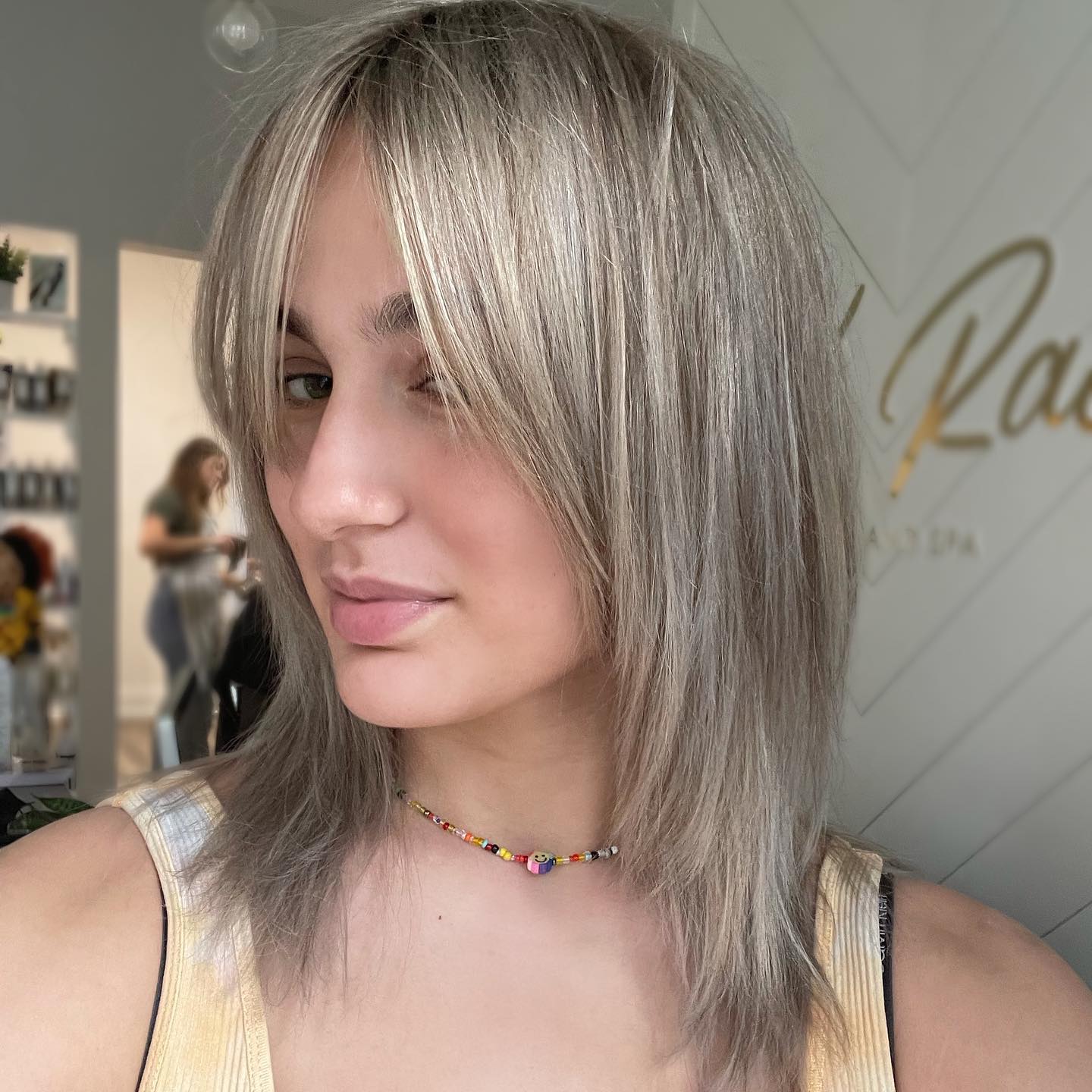 Layered Wolf Cut with Soft Blonde Highlights