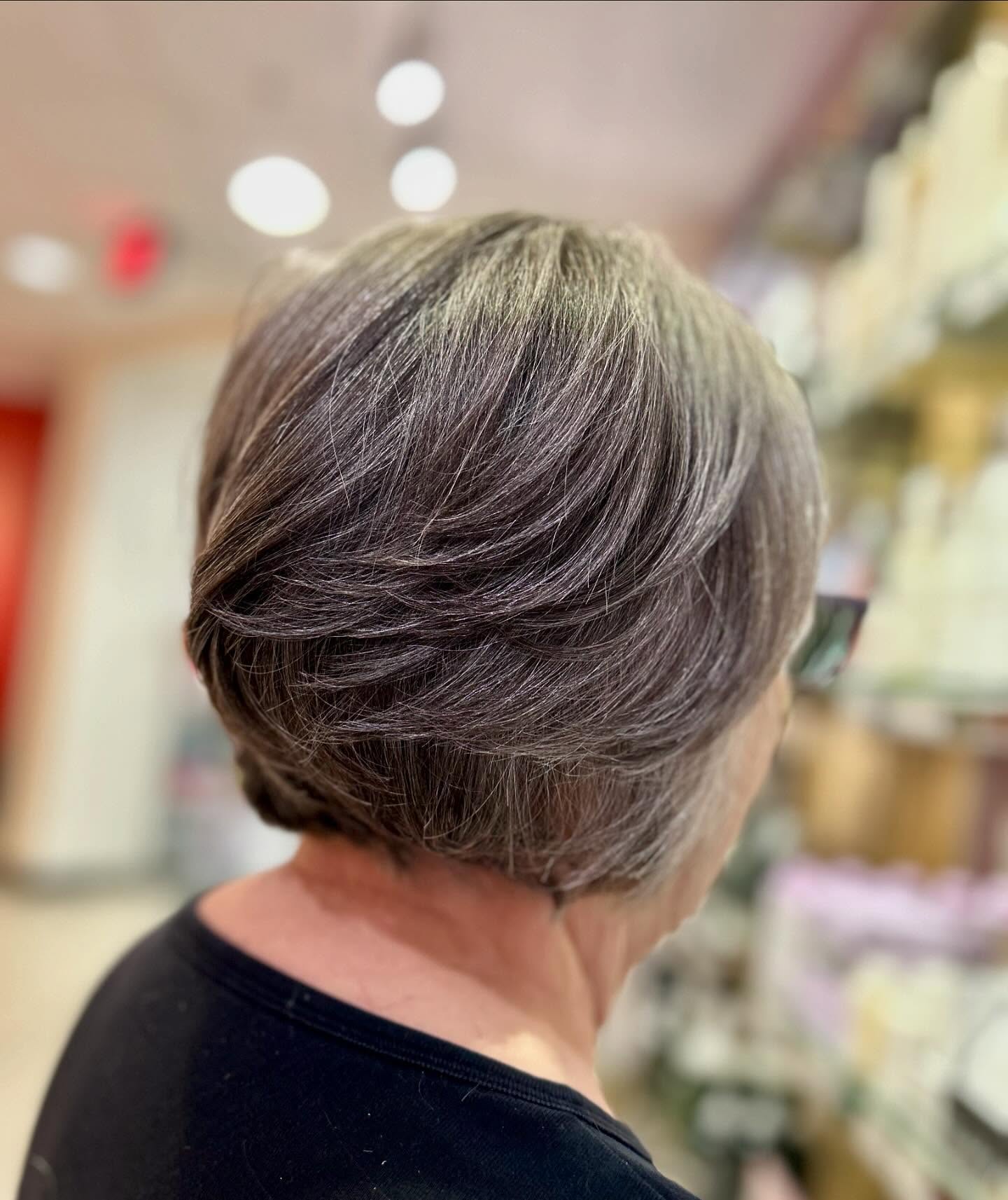 Modern Feathered Bob with Subtle Highlights
