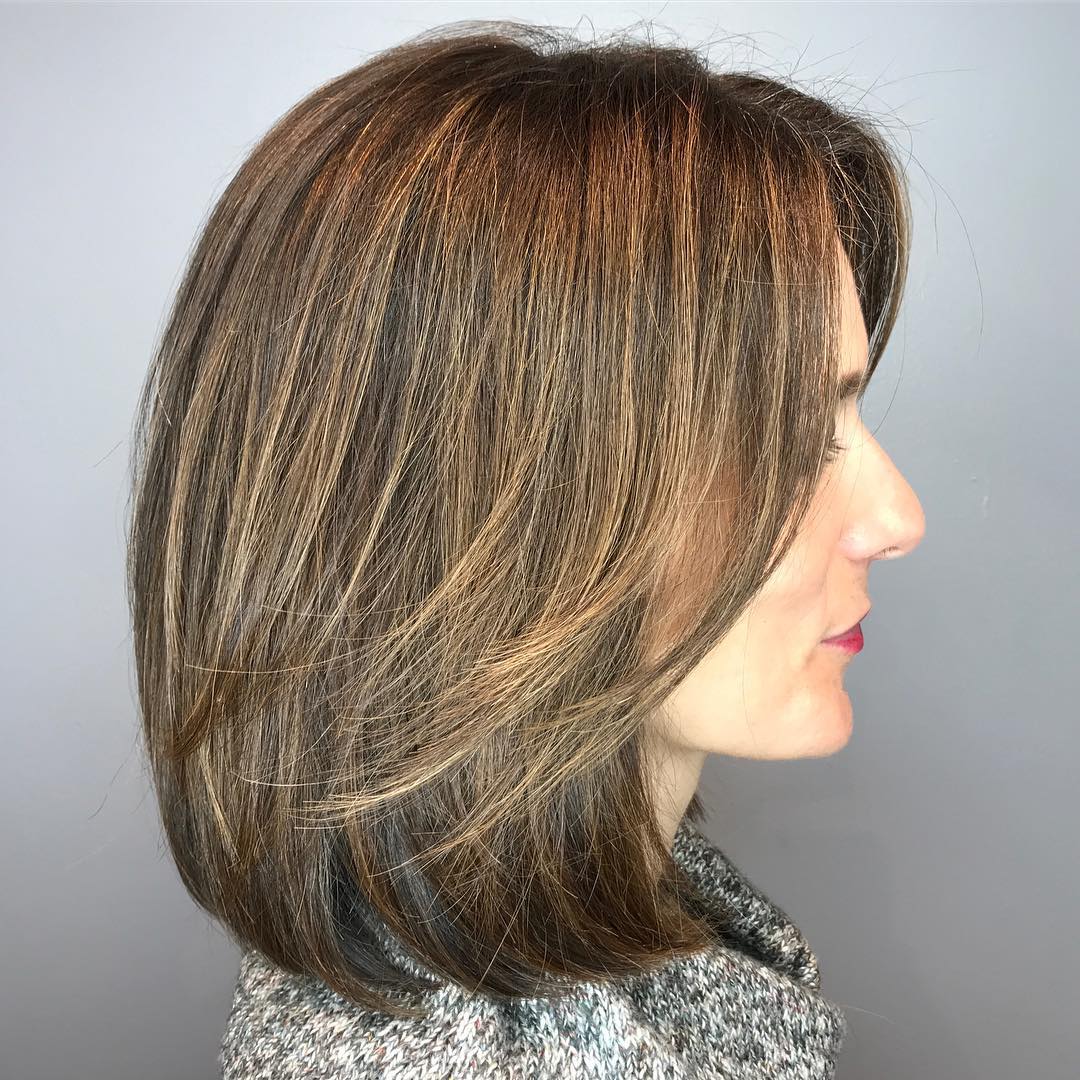 Softly Layered Chocolate Brown Lob with Subtle Caramel Highlights