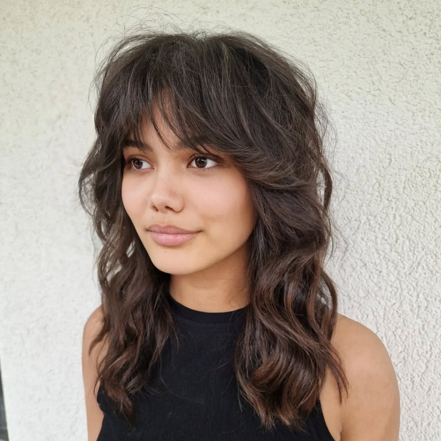 Softly Layered Wavy Shag with Face-Framing Bangs