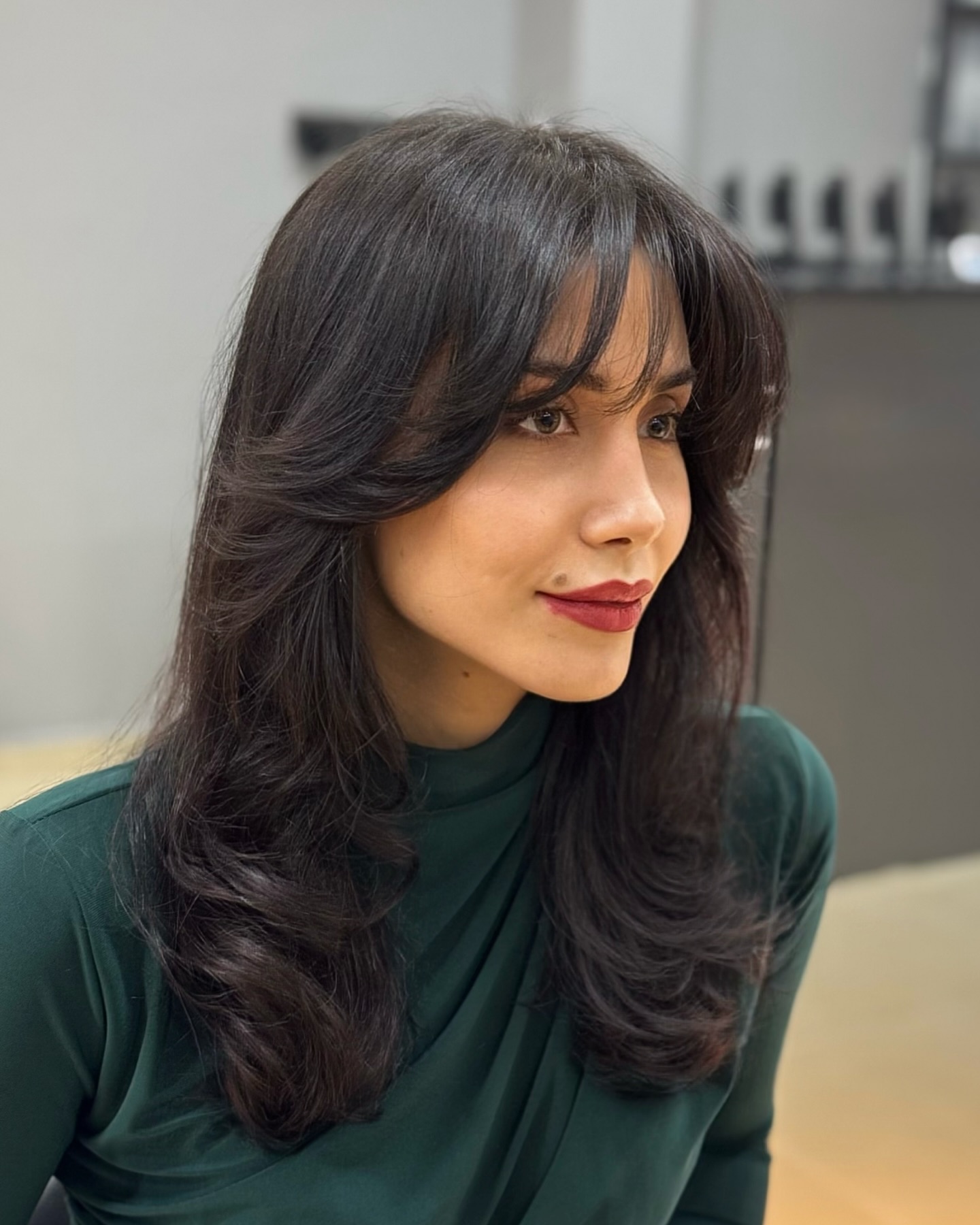 Softly Layered Wolf Cut with Subtle Face-Framing Bangs