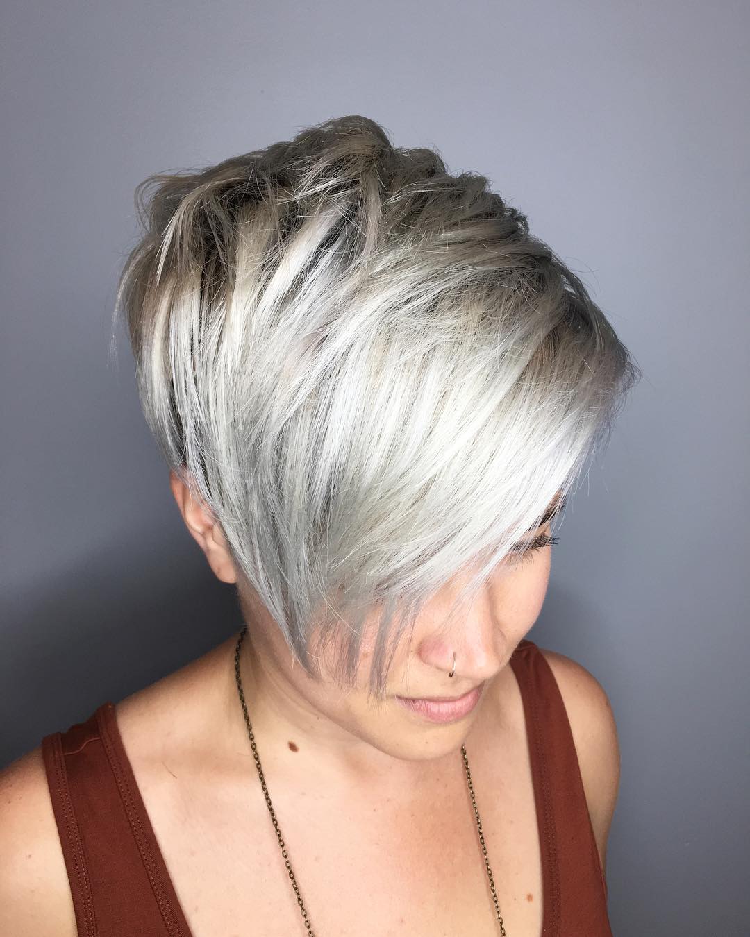 Stylish Long Pixie Cut with Soft Silver Highlights
