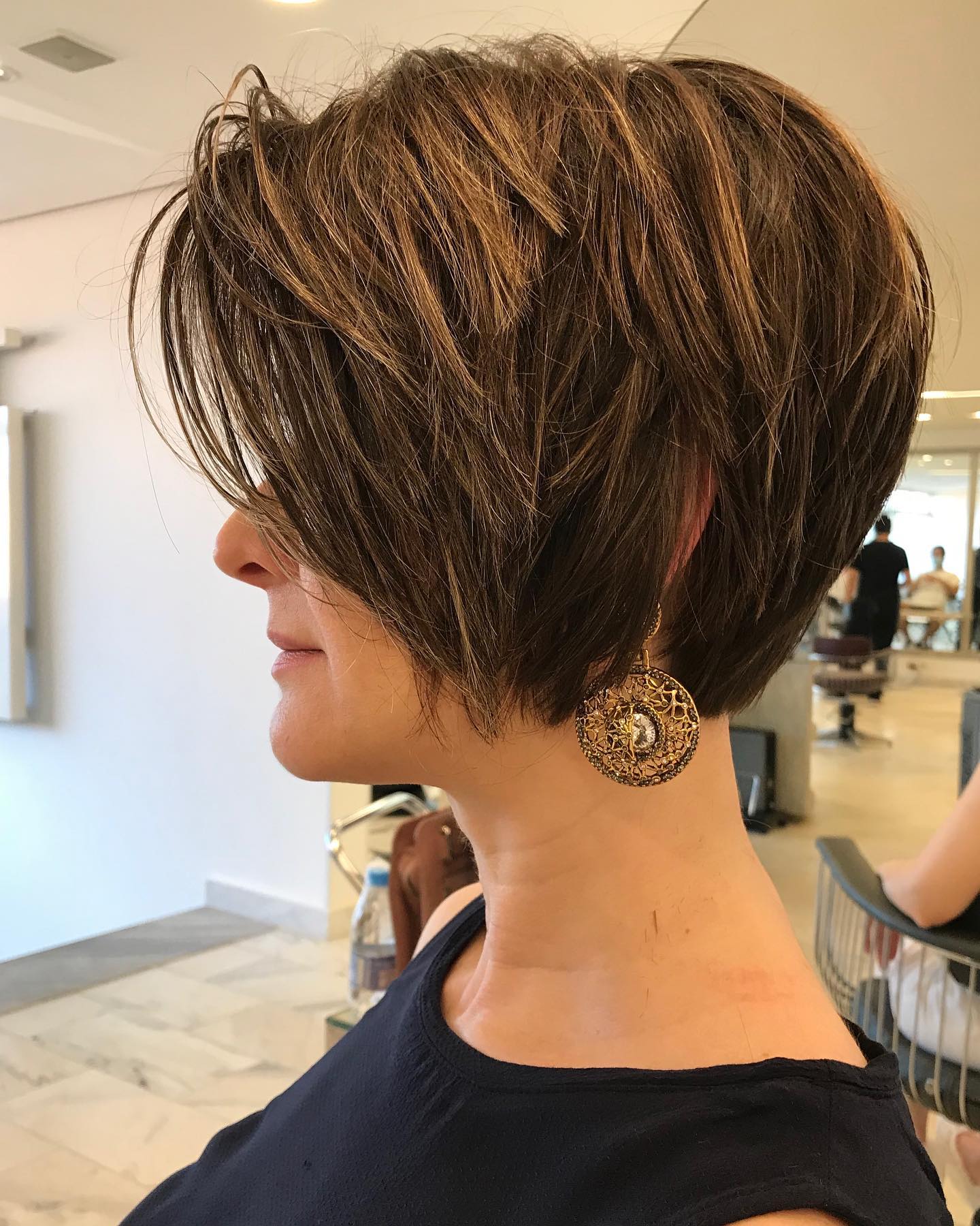 Textured Long Pixie Cut with Soft Caramel Highlights
