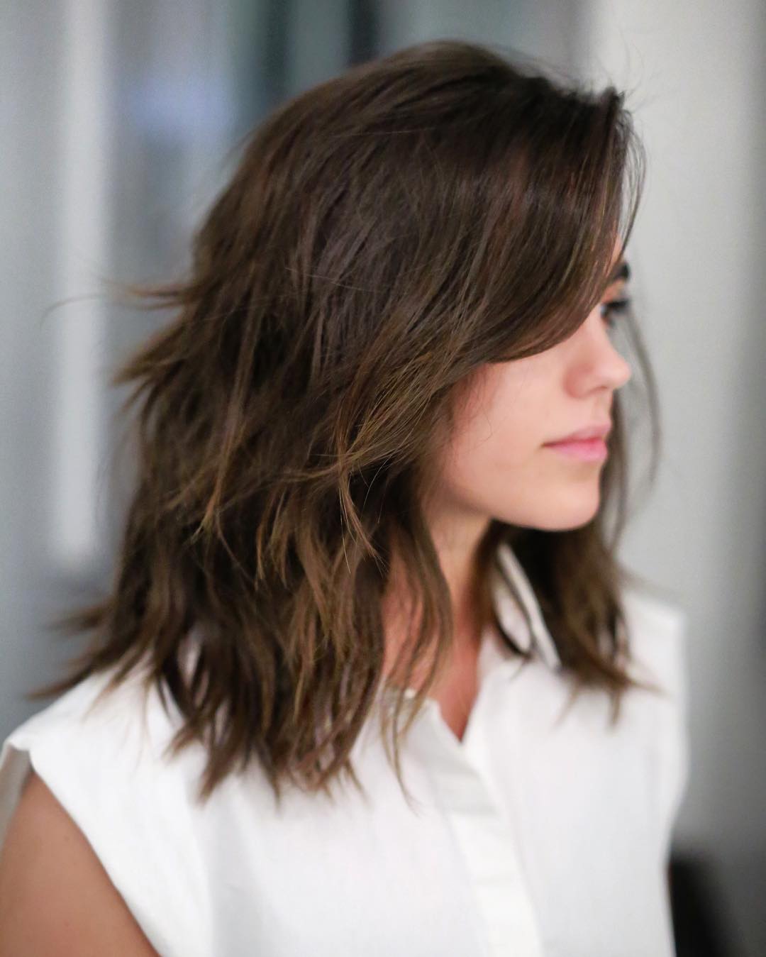 Textured Shoulder-Length Cut with Natural Waves