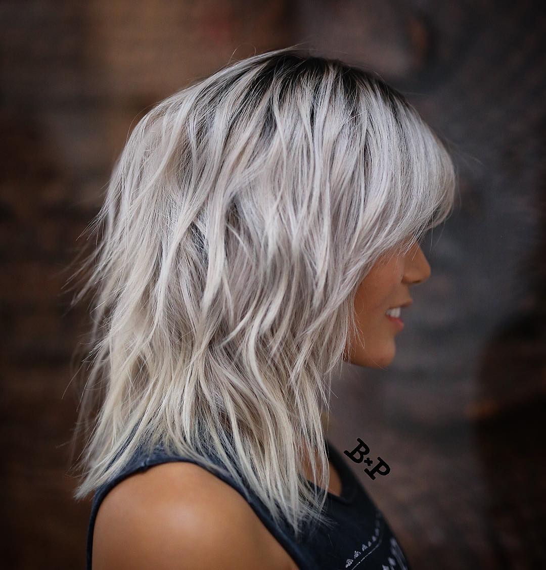 Textured Silver Shoulder-Length Cut with Face-Framing Layers