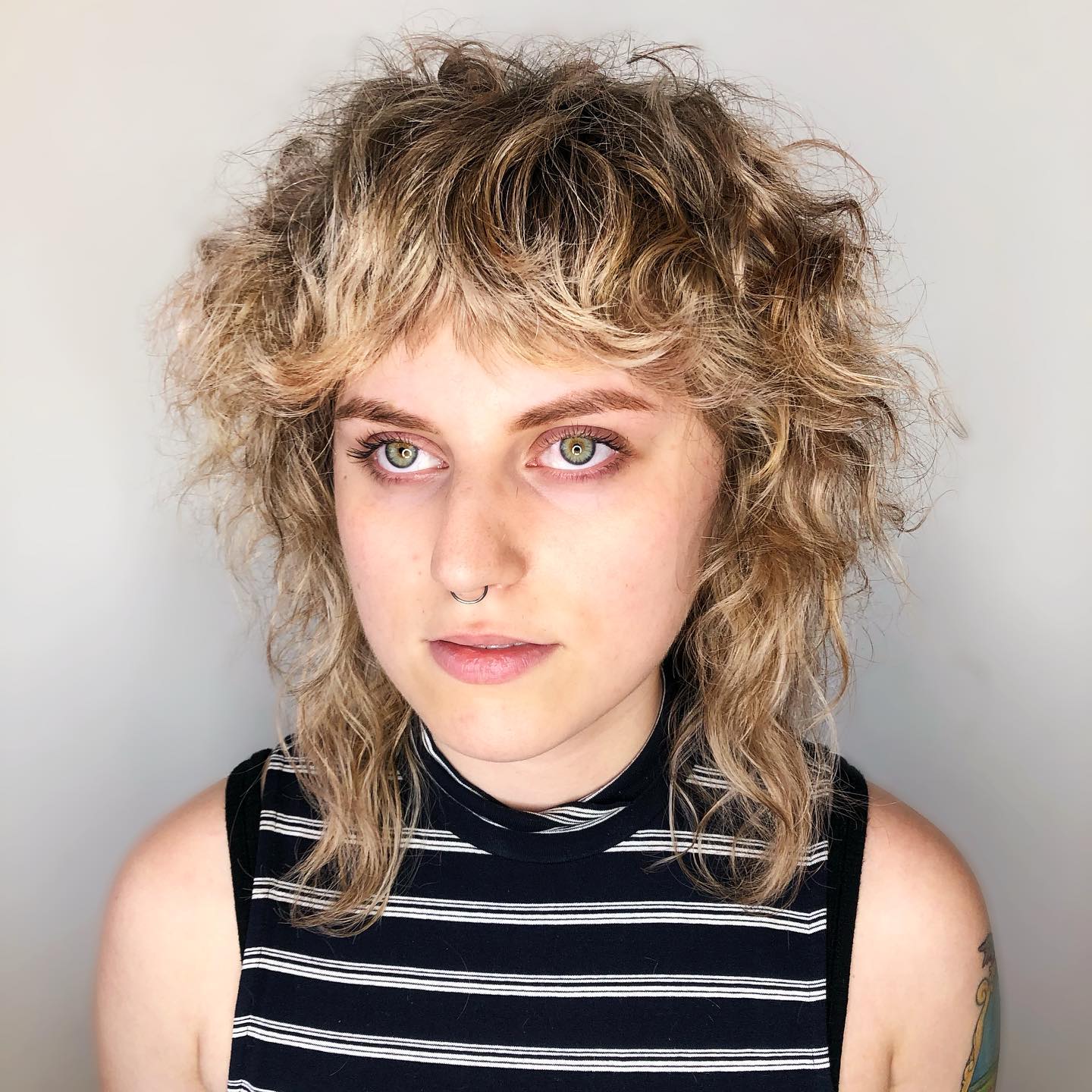 Trendy Textured Cropped Wolf Cut with Defined Curls