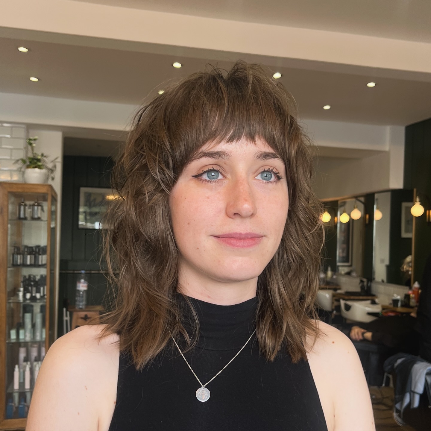 Chic Shaggy Bangs with Soft Textured Layers