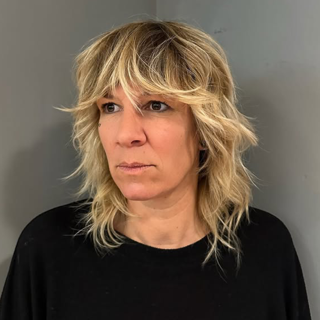 Effortlessly Layered Shag with Playful Bangs