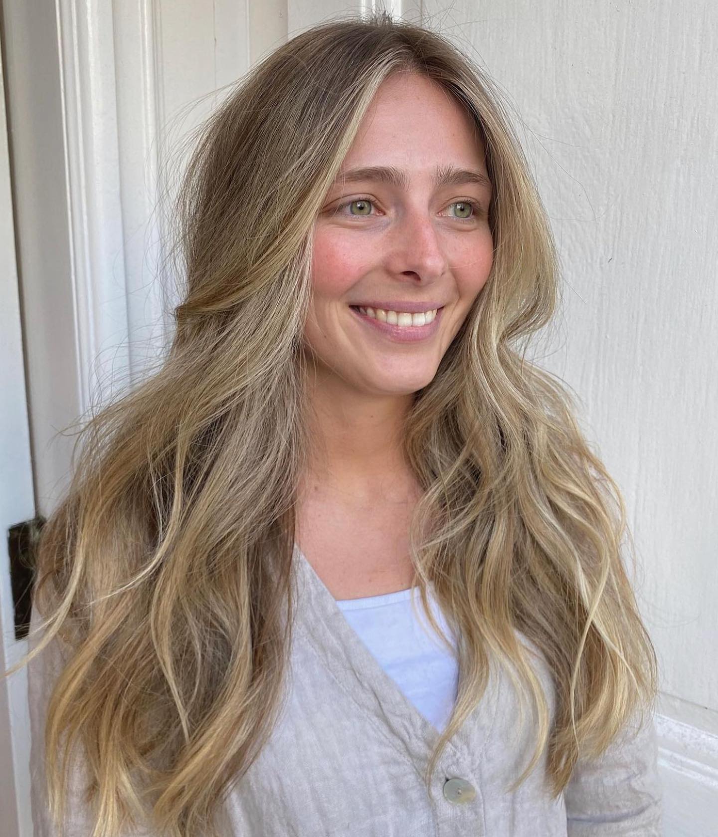 Elegant Long Tousled Waves with Soft Highlights