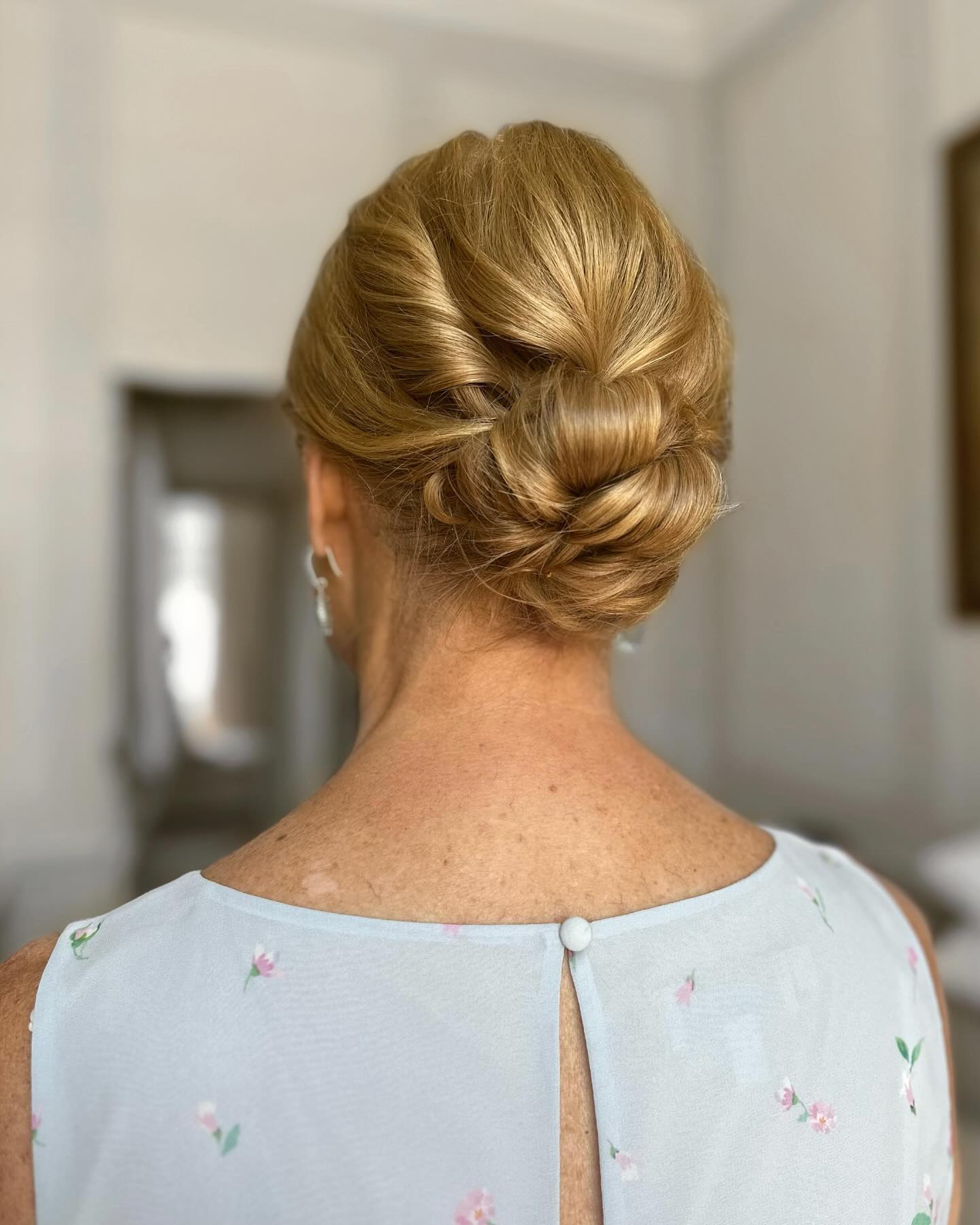 Elegant Twisted Bun Updo with Textured Details