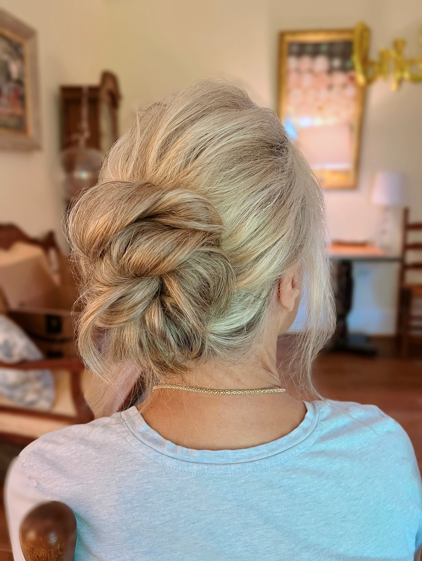 Elegant Twisted Low Bun with Soft Volume